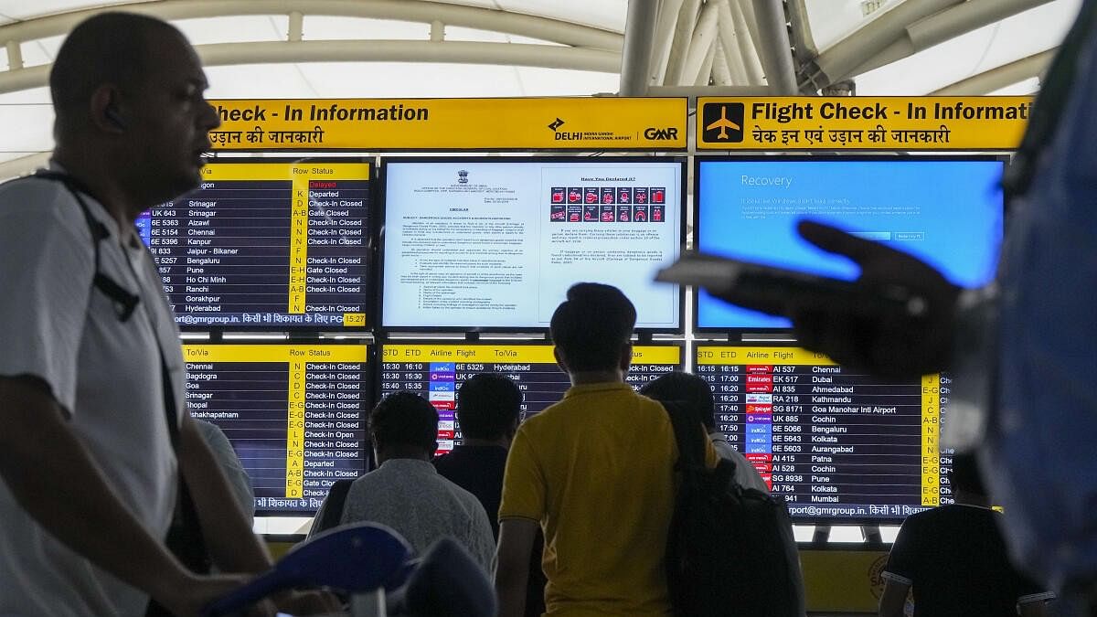 <div class="paragraphs"><p>Passengers look at screens, one of them showing Blue Screen error, at T3 Terminal of the Indira Gandhi International Airport amid Microsoft outage, in New Delhi.</p></div>