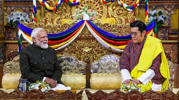 <div class="paragraphs"><p>Prime Minister Narendra Modi with Bhutan's King Jigme Khesar Namgyel Wangchuck during a meeting at the Tashichho Dzong Palace, in Thimphu, Friday, March 22, 2024.</p></div>