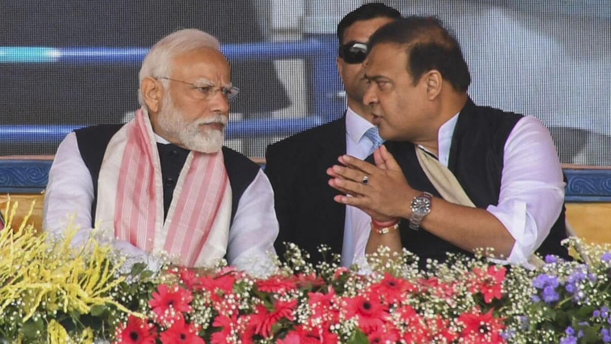 <div class="paragraphs"><p>Prime Minister Narendra Modi (L) with Assam Chief Minster Himanta Biswa Sarma (R).</p></div>