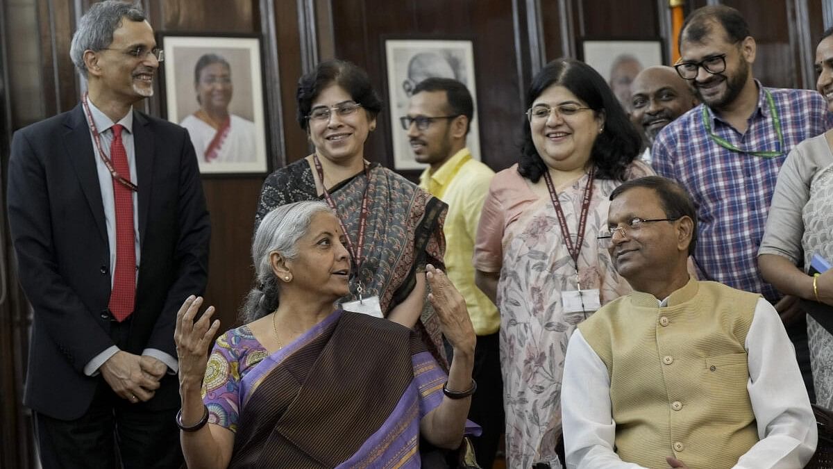 <div class="paragraphs"><p>Union Finance Minister Nirmala Sitharaman with MoS Pankaj Chaudhary and the Budget team  giving final touches to the Union Budget in New Delhi on Monday, July 22, 2024.</p></div>