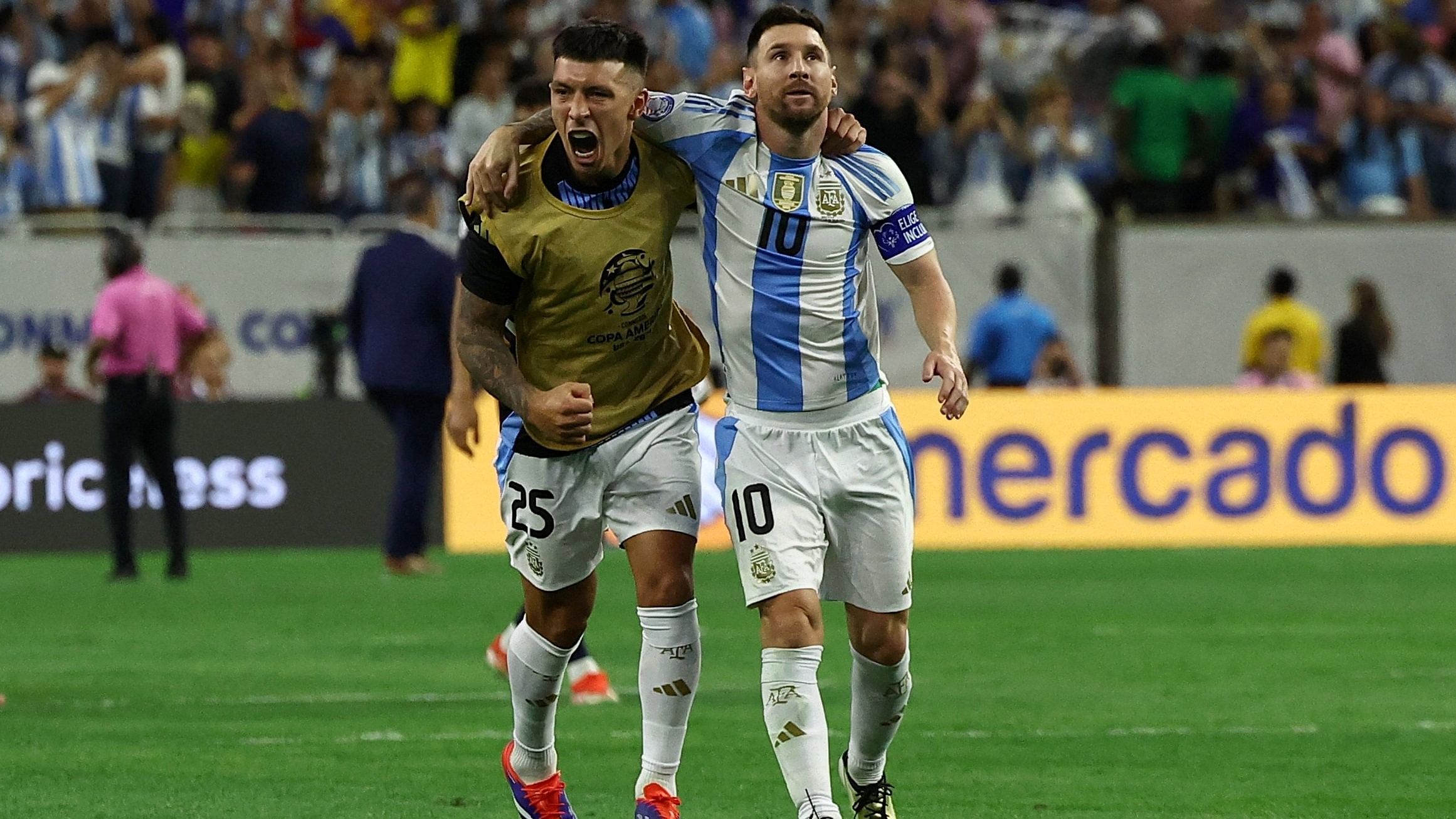 <div class="paragraphs"><p>Argentina's Lionel Messi and Lisandro Martinez celebrate after winning the penalty shootout.</p></div>