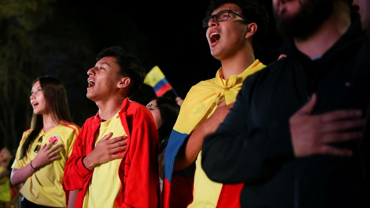 <div class="paragraphs"><p>Fans sing the Colombian national anthem before the Copa America semi-final match between Colombia and Uruguay.</p></div>