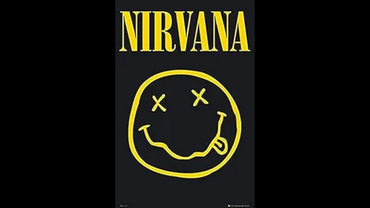 <div class="paragraphs"><p>Nirvana band name visible along with the smiley face logo in this image</p></div>