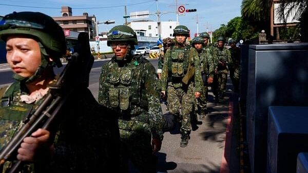 <div class="paragraphs"><p>Soldiers take part in the first day of the annual Han Kuang military drills in Taoyuan, Taiwan July 22, 2024.</p></div>