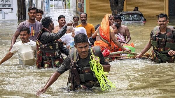 <div class="paragraphs"><p>Army personnel during a rescue and relief operation following rising water levels in the Garra and Khannaut rivers, in Shahjahanpur, Uttar Pradesh.</p></div>