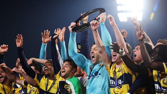 <div class="paragraphs"><p>Central Coast Mariners celebrating after winning the A-League.</p></div>