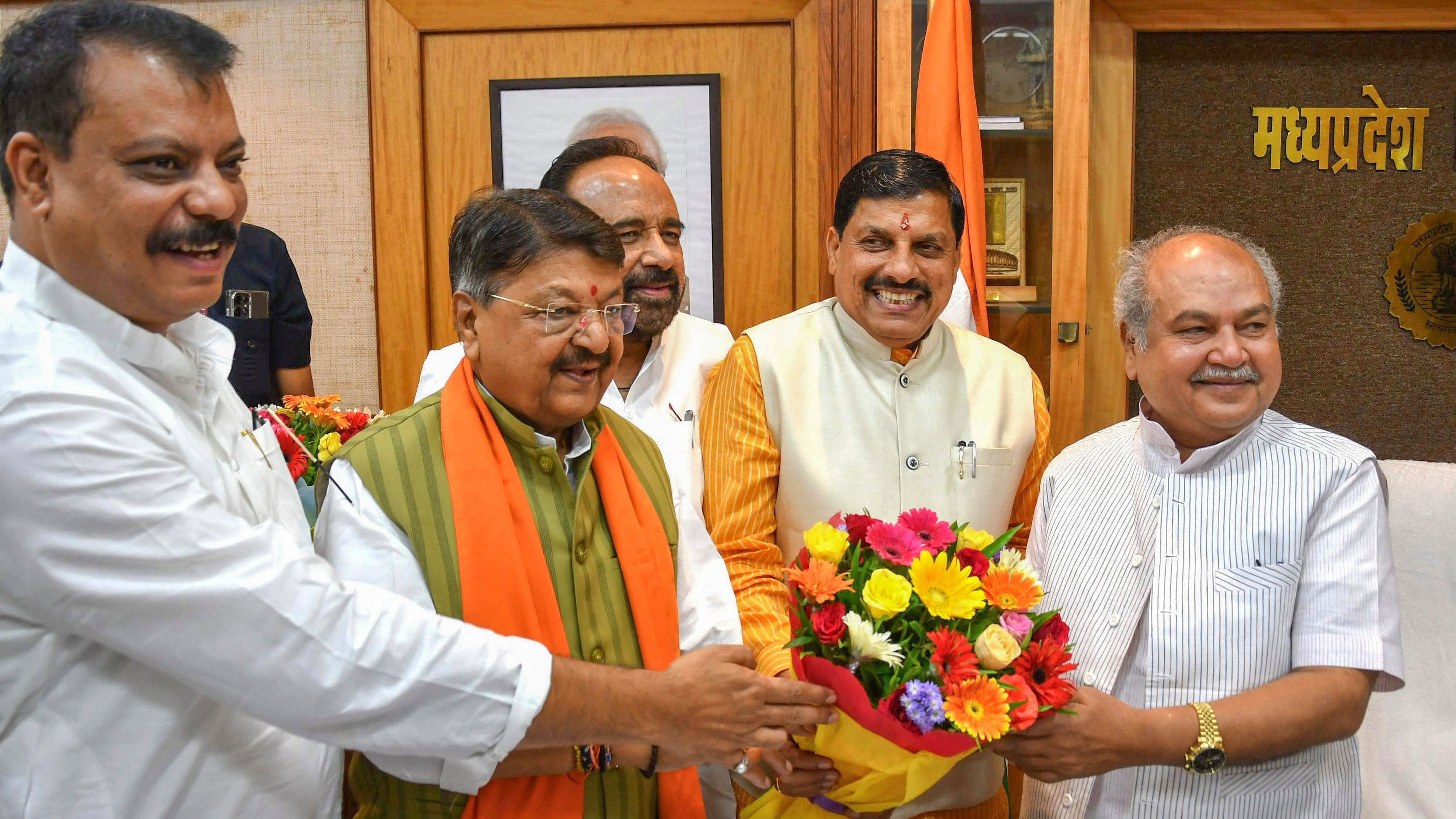 <div class="paragraphs"><p>Madhya Pradesh Chief Minister Mohan Yadav and Leader of Opposition Umang Singhar greet Legislative Assembly Speaker Narendra Singh Tomar on the first day of the monsoon session of the Madhya Pradesh State Assembly, in Bhopal, on Monday.</p></div>