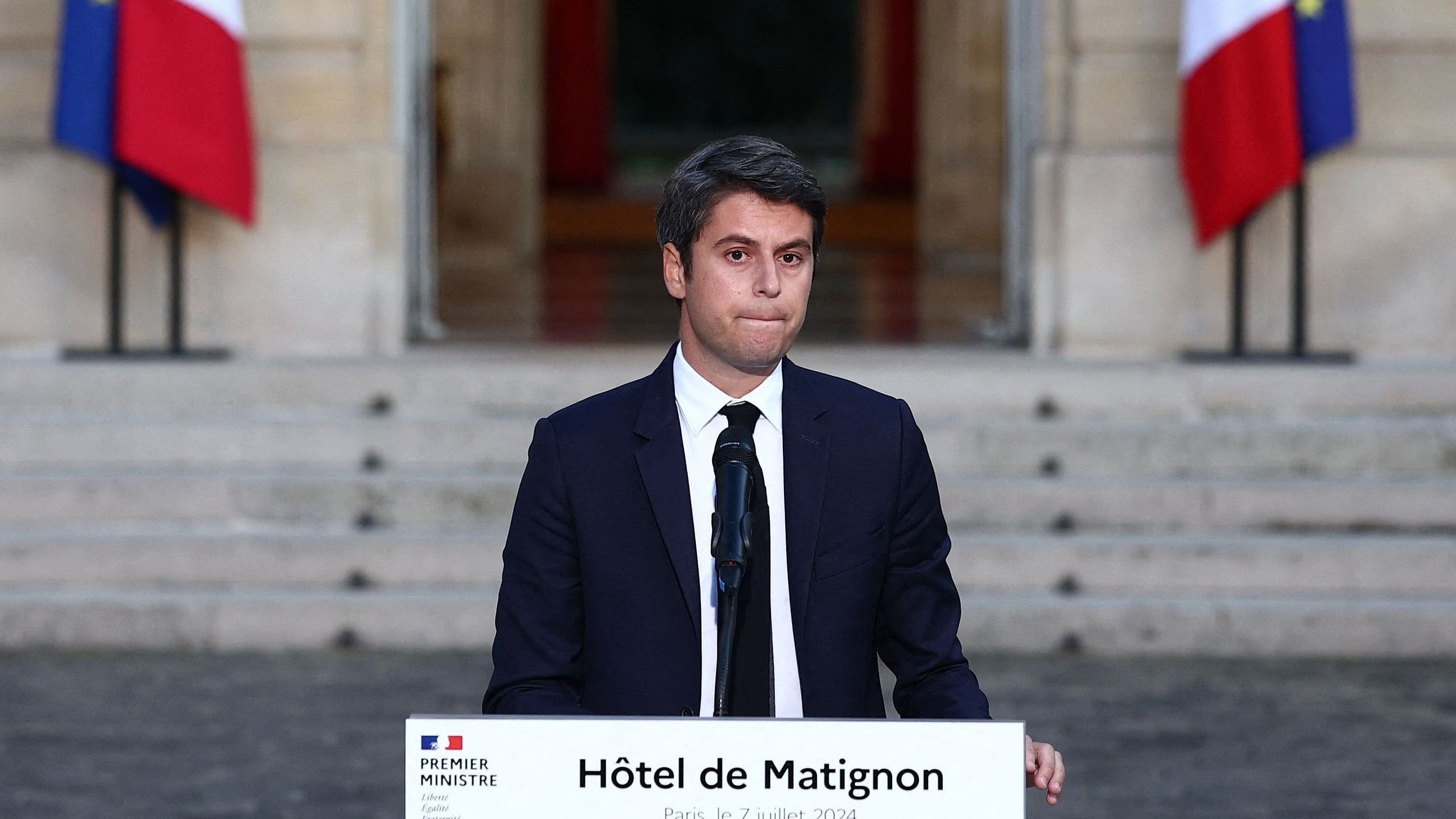 Gabriel Attal, French Prime Minister and French presidential majority group "Ensemble pour la Republique" candidate, delivers a speech after partial results in the second round of the early French parliamentary elections, at Hotel Matignon in Paris in Paris, France, July 7, 2024. REUTERS/Guglielmo Mangiapane