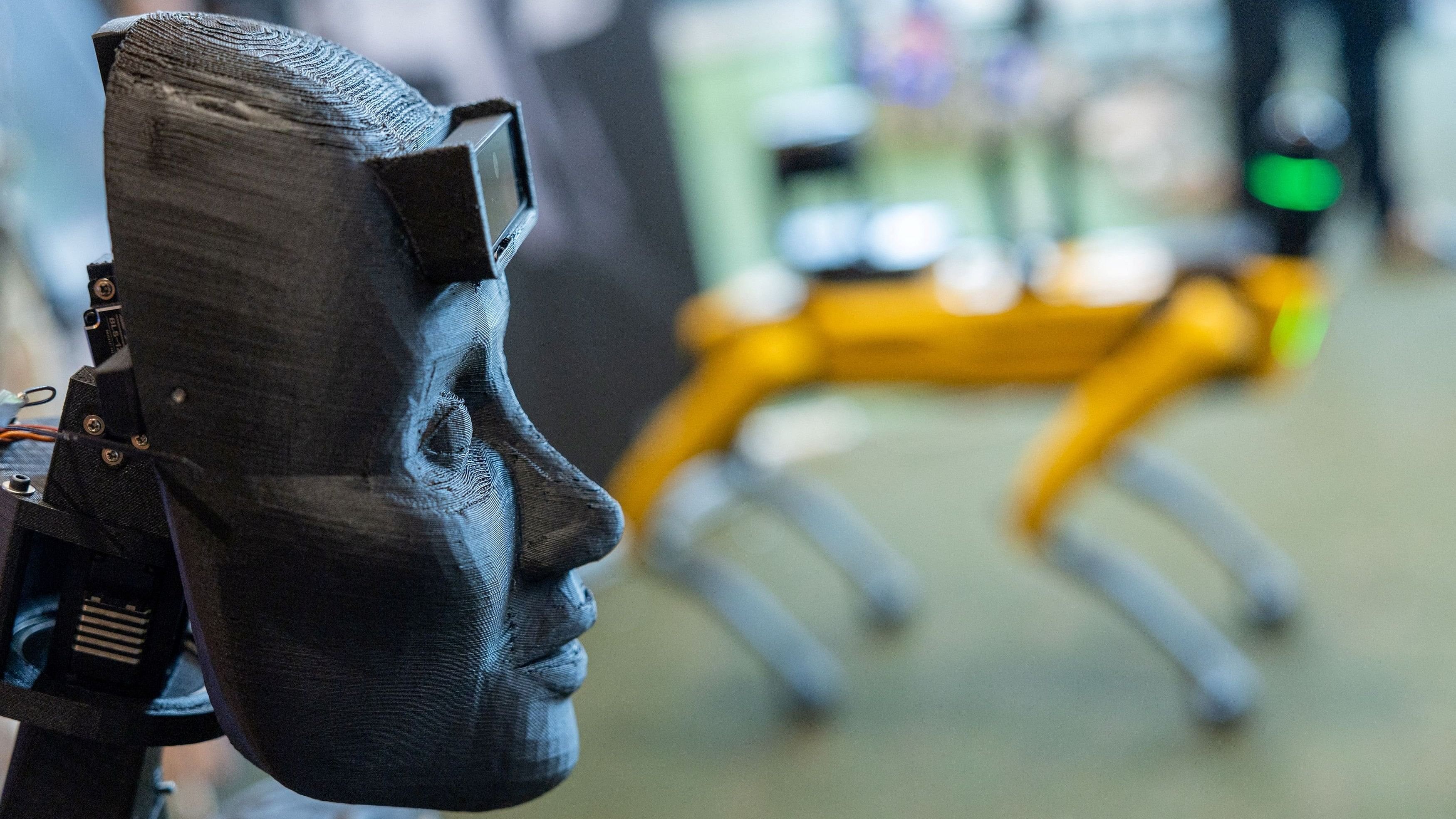 <div class="paragraphs"><p>Representational Image] A 3D printed human face by Robot Studio is seen next to a Leica BLK ARC, an autonomous laser scanning module mounted on a Boston Dynamics Spot robot during the AI for Good Global summit on artificial intelligence, organised by the International Telecommunication Union , in Geneva, Switzerland.</p></div>