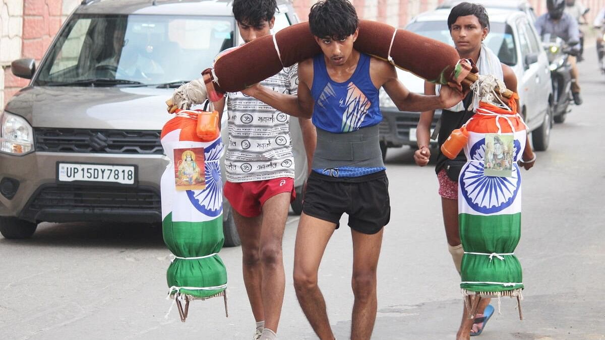 <div class="paragraphs"><p>Kanwariyas or Lord Shiva devotees on their way to fetch water from Ganga River, ahead of the holy month of 'Shravan', in Meerut, Uttar Pradesh.</p></div>