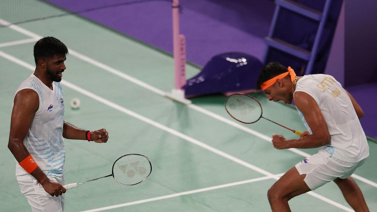 <div class="paragraphs"><p>Chirag Shetty of India and Satwiksairaj Rankireddy of India celebrate after winning the Group C match against Fajar Alfian of Indonesia and Muhammad Rian Ardianto of Indonesia.</p></div>