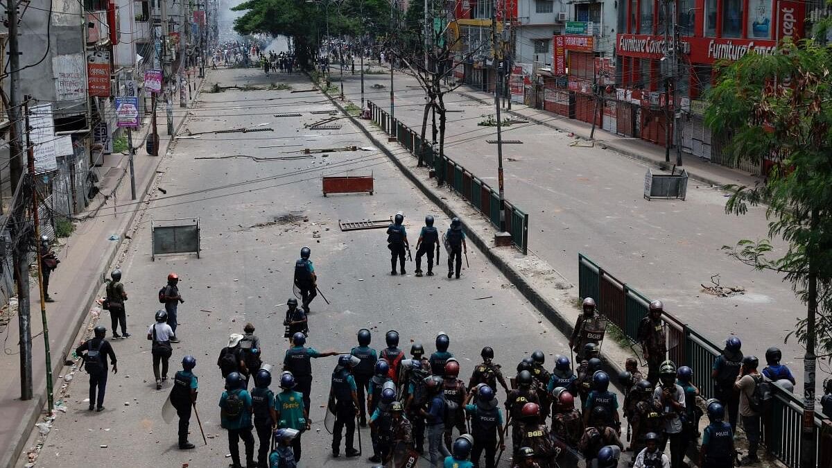 <div class="paragraphs"><p>Members of Border Guard Bangladesh (BGB) and the police work to control the protesters outside the state-owned Bangladesh Television as violence erupts after anti-quota protests by students, in Dhaka, Bangladesh, July 19, 2024.</p></div>