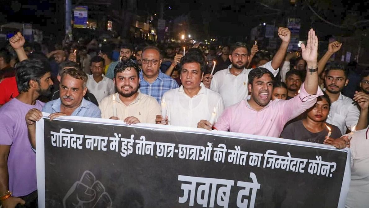 <div class="paragraphs"><p>NSUI members protest over the death of 3 UPSC aspirants drown in the flooded basement of Rau’s IAS institute at Old Rajinder Nagar area, in New Delhi. Image for representation only.</p></div>