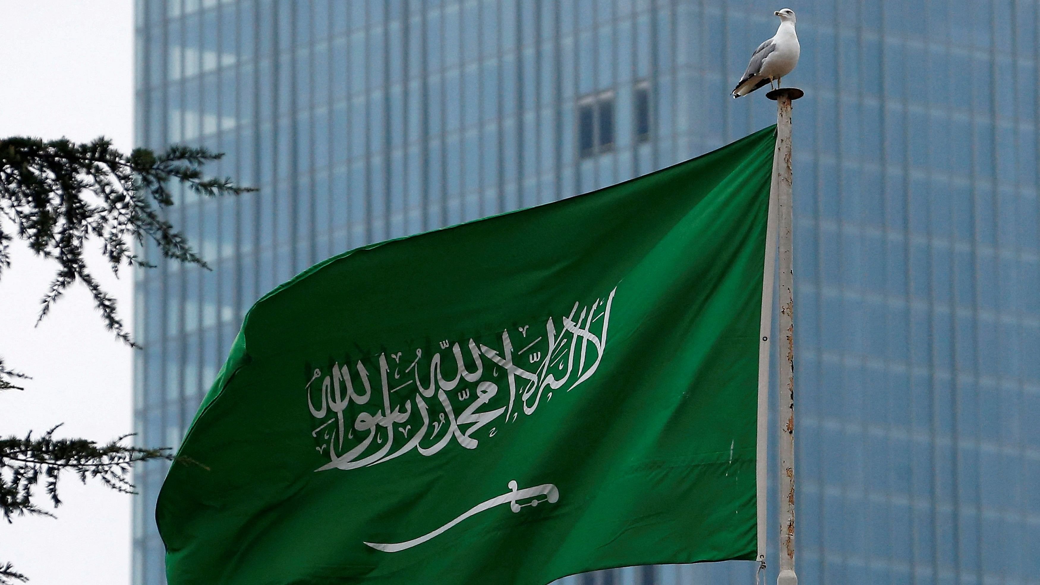 <div class="paragraphs"><p>A Saudi flag flutters atop Saudi Arabia's consulate in Istanbul, Turkey </p></div>