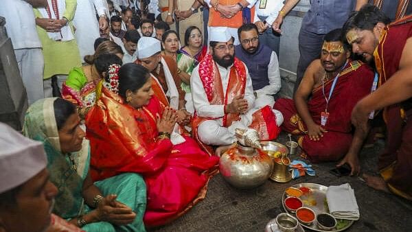 <div class="paragraphs"><p>Maharashtra Chief Minister Eknath Shinde and wife Lata Eknath Shinde offer prayers on the occasion of ‘Devshayani Ekadashi’ at a temple at Pandharpur, in Solapur district.</p></div>