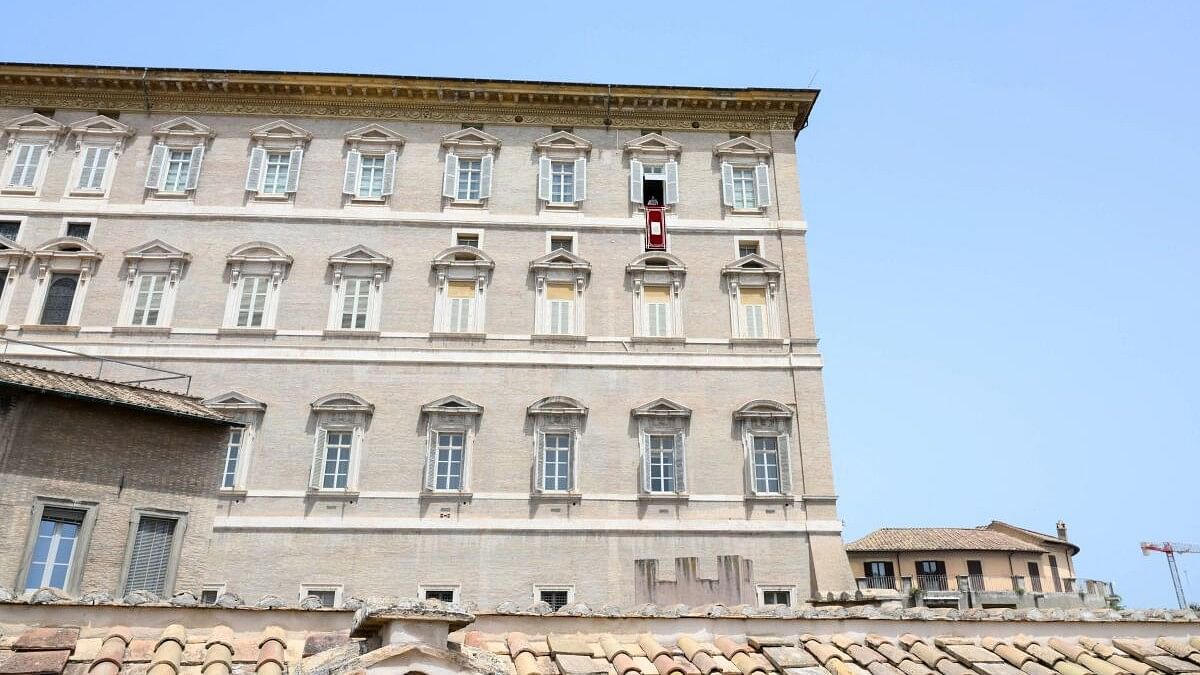 <div class="paragraphs"><p>In this file photo, Pope Francis leads the Angelus prayer from his window at the Vatican, </p></div>