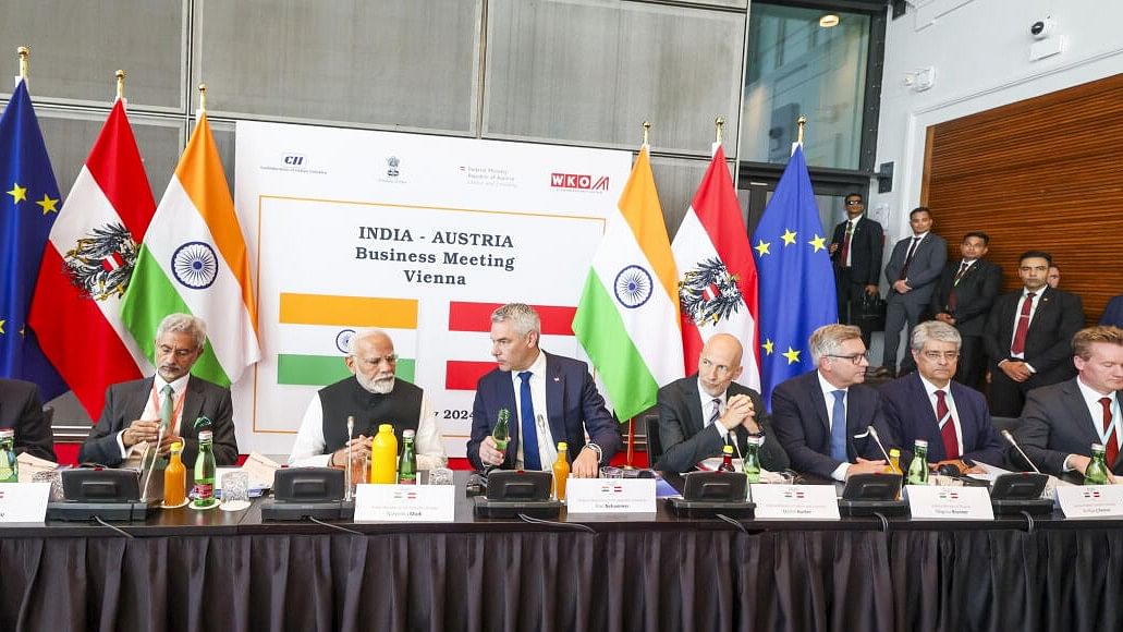 <div class="paragraphs"><p>Prime Minister Narendra Modi and Austrian Chancellor Karl Nehammer jointly address Austrian and Indian CEOs during the India-Austria Business meeting, in Vienna.</p></div>