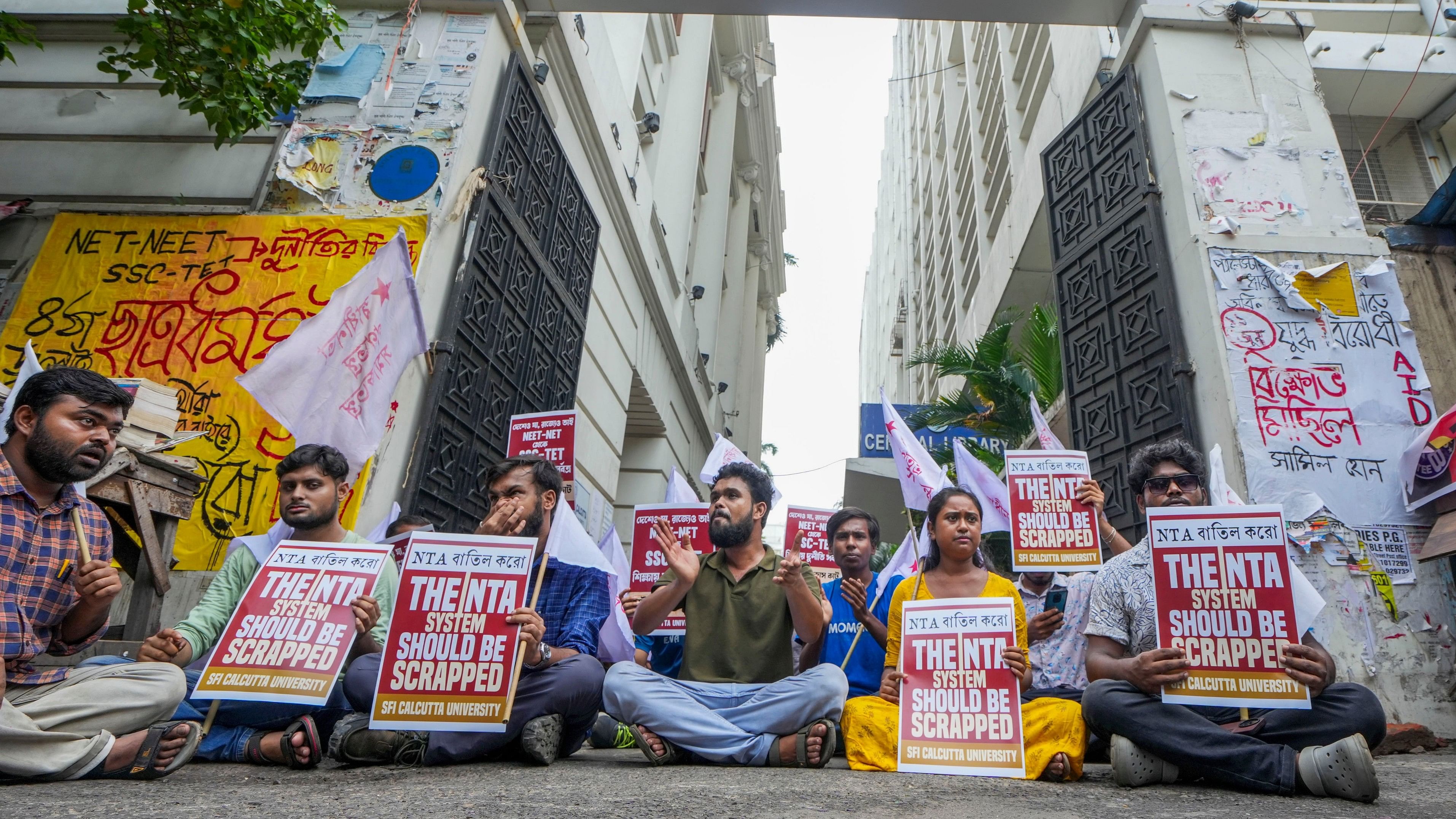 <div class="paragraphs"><p>Students' Federation of India (SFI) activists stage a protest over the alleged irregularities in NEET-UG exams of 2024, outside Calcutta University in Kolkata,.</p></div>