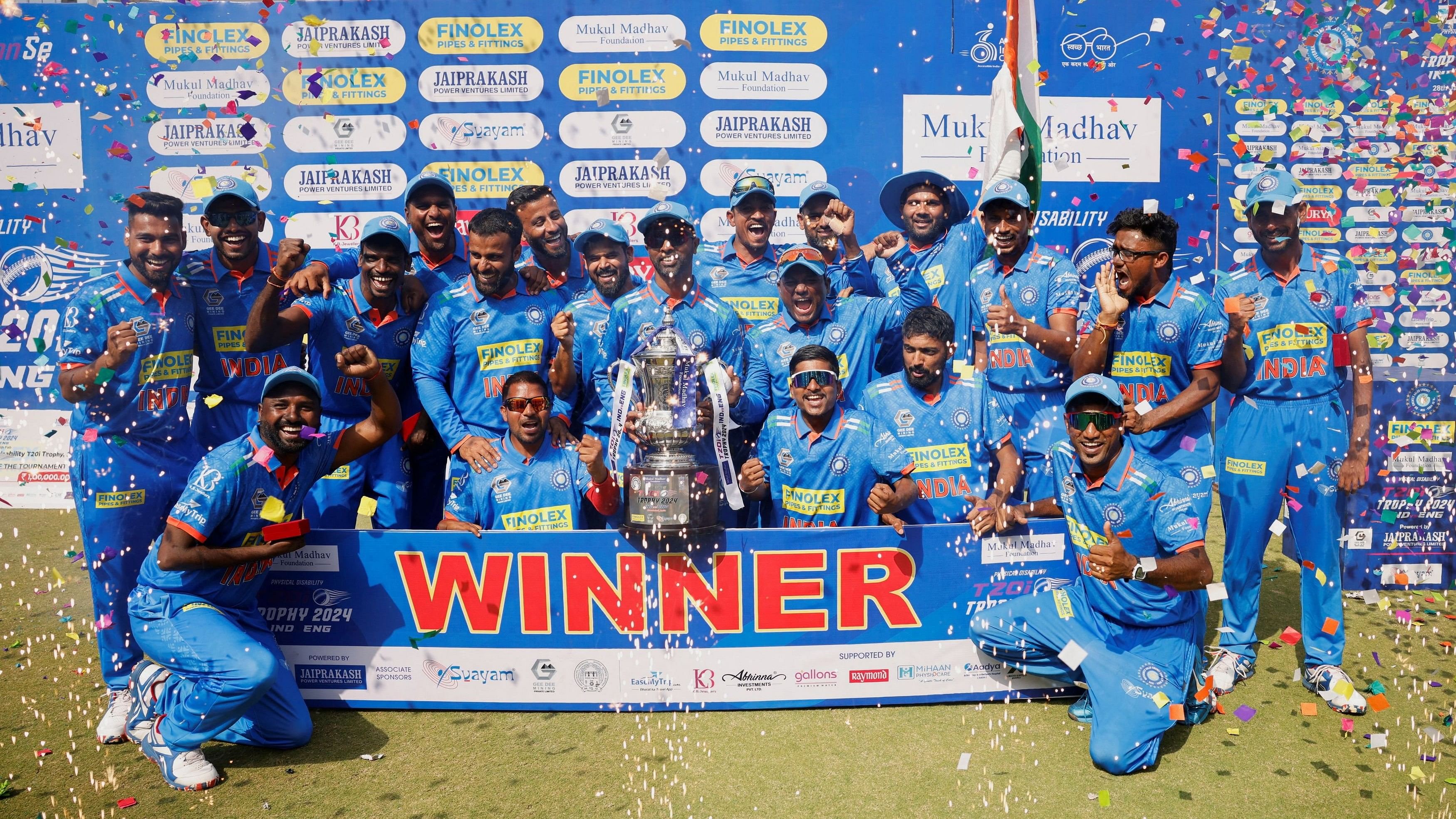 <div class="paragraphs"><p>Indian physical disability cricket team players celebrate with a trophy after winning a T20 series against England.</p></div>
