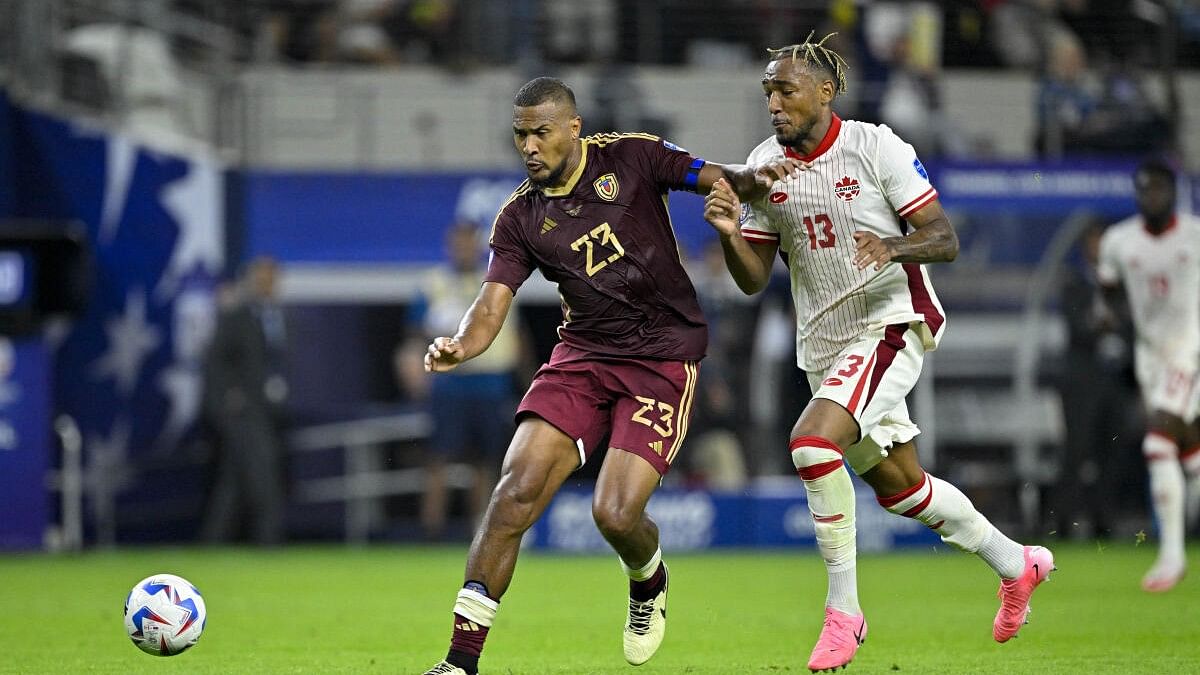 <div class="paragraphs"><p>Jul 5, 2024; Arlington, TX, USA; Venezuela forward Jose Salomon Rondon (23) and Canada defender Derek Cornelius (13) chase the ball during the second half in the 2024 Copa America quarterfinal at AT&amp;T Stadium. </p></div>