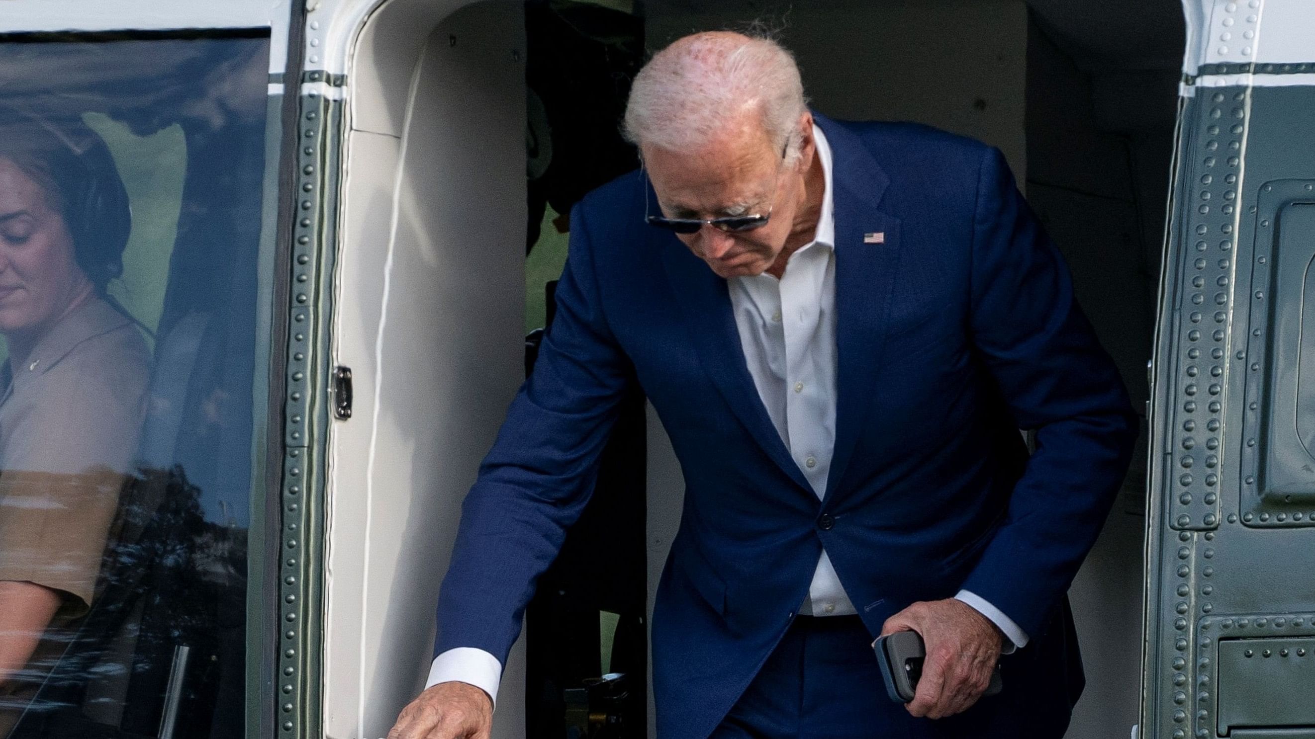 <div class="paragraphs"><p>U.S. President Joe Biden exits Marine One after arriving on the South Lawn of the White House in Washington</p></div>