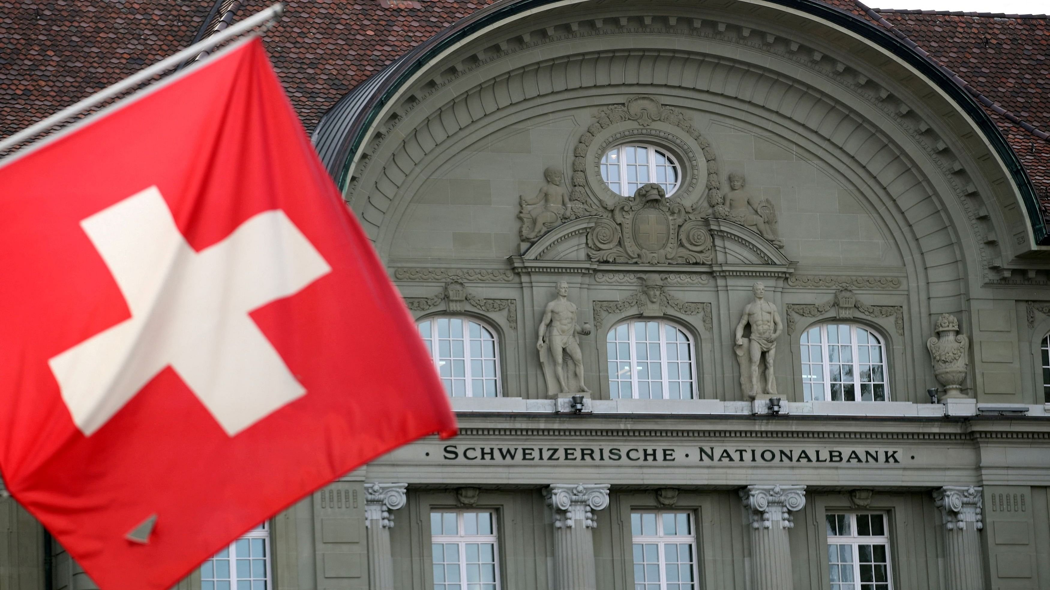 <div class="paragraphs"><p> A Swiss flag is pictured in front of the Swiss National Bank  in Bern, Switzerland.</p></div>