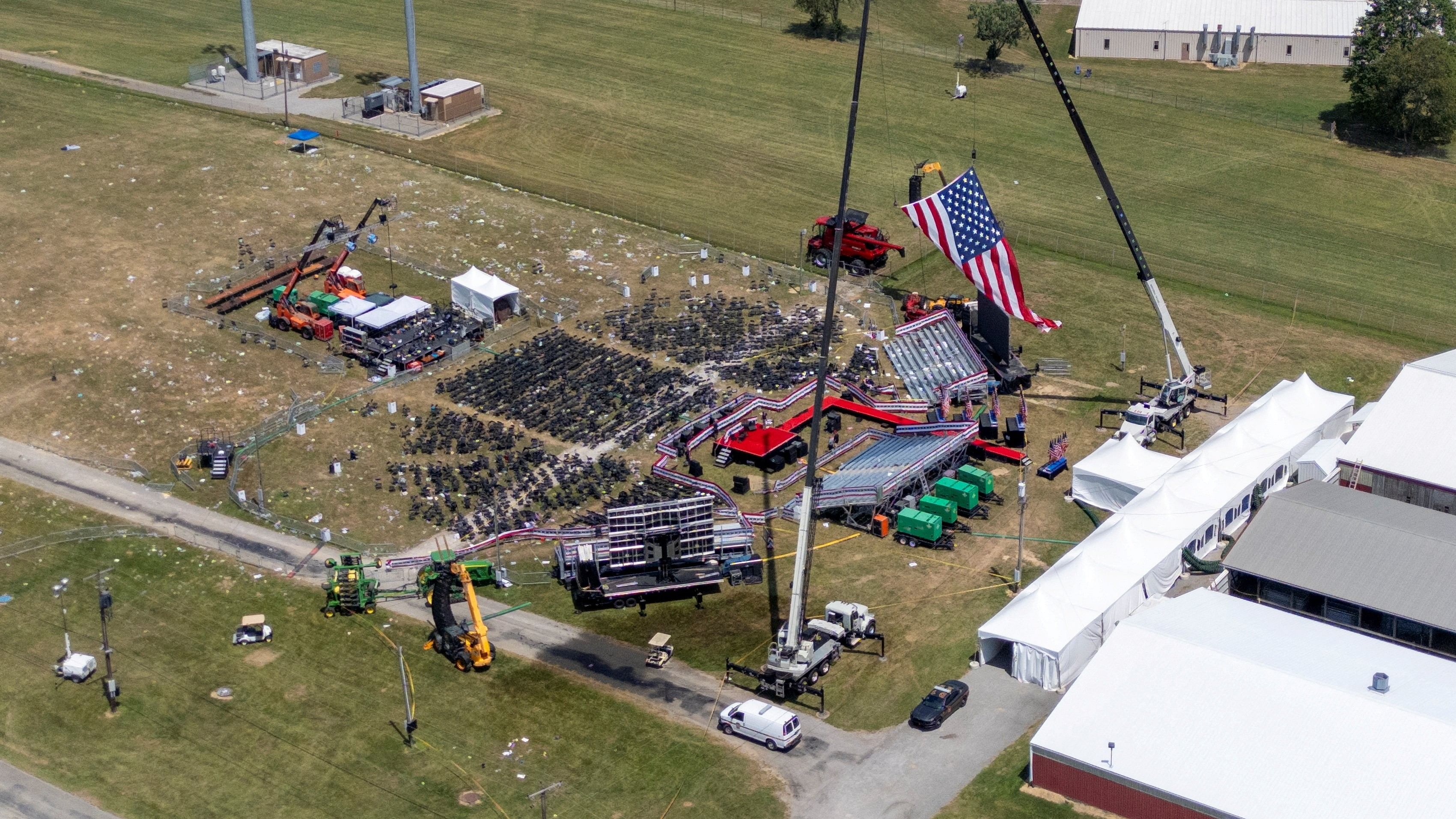 <div class="paragraphs"><p>A drone view shows the stage where Republican presidential candidate and former US president Donald Trump had been standing during an assassination attempt the day before, and the roof of a nearby building where a gunman was shot dead by law enforcement, in Butler, Pennsylvania, US. </p></div>