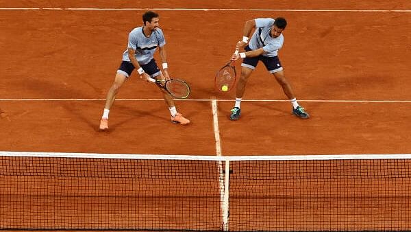 <div class="paragraphs"><p>The men's doubles team of Maximo Gonzalez  and Andres Molteni of Argentina in action at the Paris Olympics 2024.</p></div>