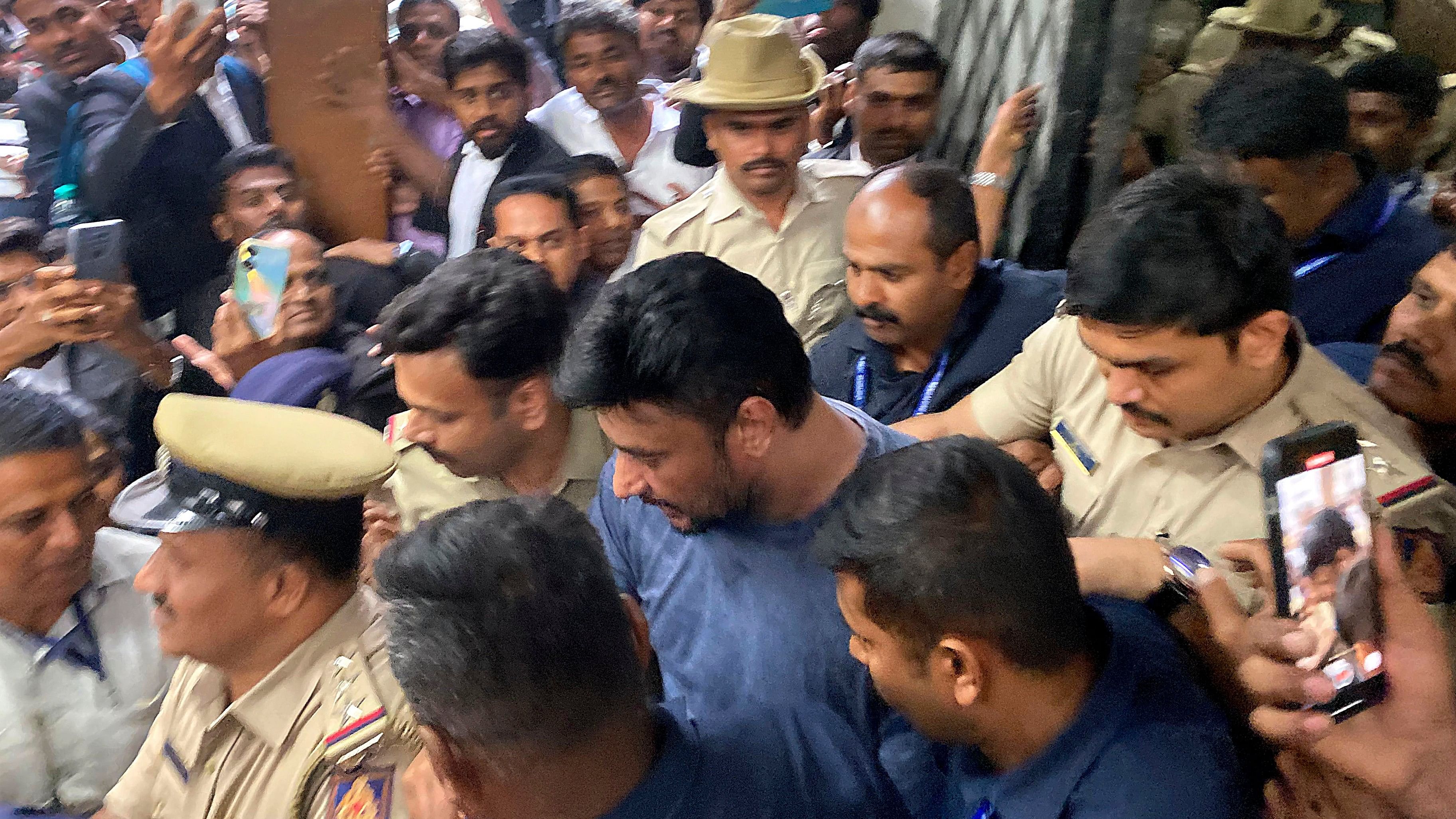 <div class="paragraphs"><p>Actor Darshan being taken to a Bengaluru court in connection with the Renukaswamy murder case, in Bengaluru.</p></div>