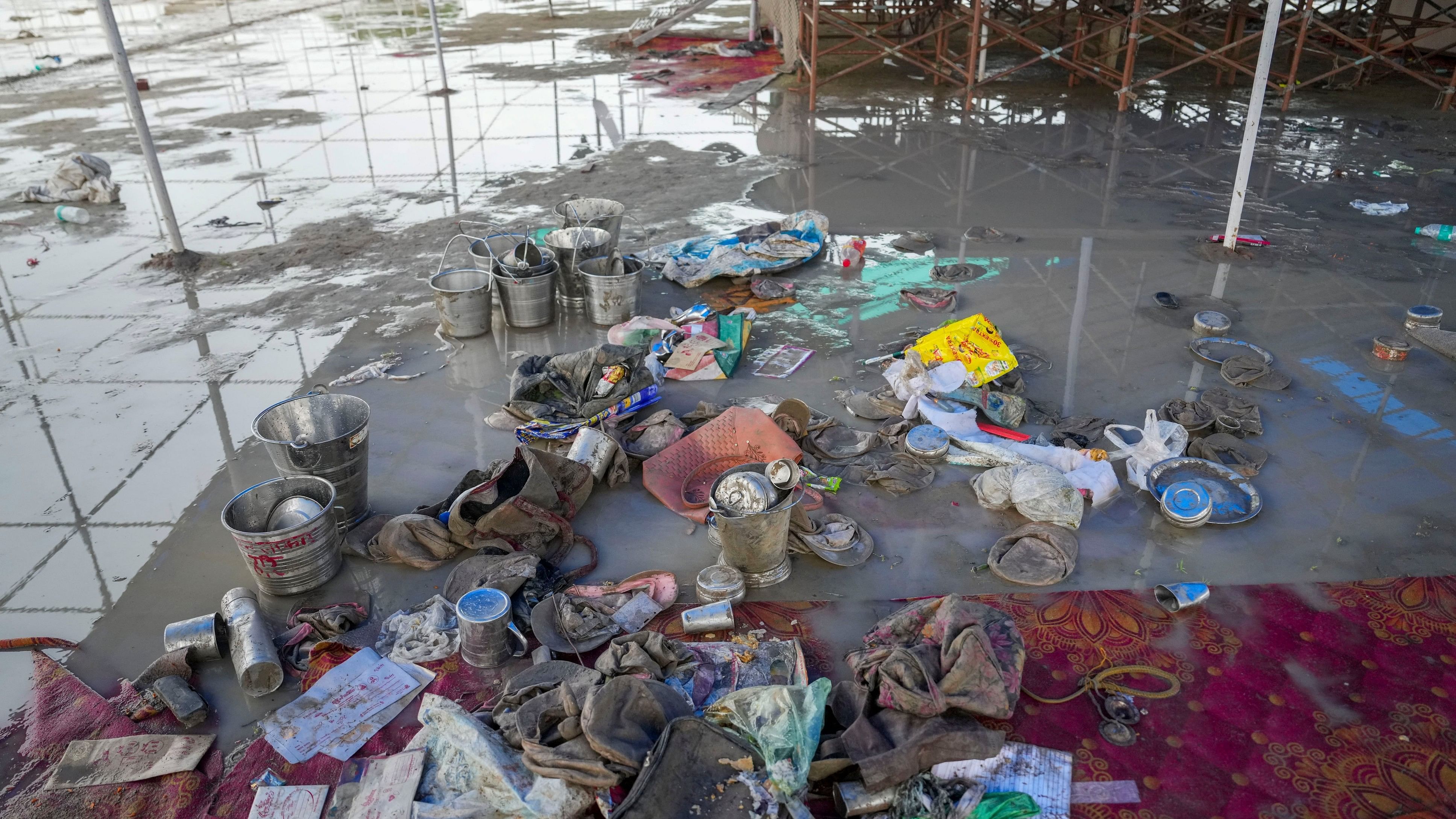 <div class="paragraphs"><p> Belongings of followers of Bhole Baba lying at the scene a day after a massive stampede that took place during a 'satsang' (religious congregation), in Sikandara Rao area in Hathras district, Wednesday, July 3, 2024.   </p></div>