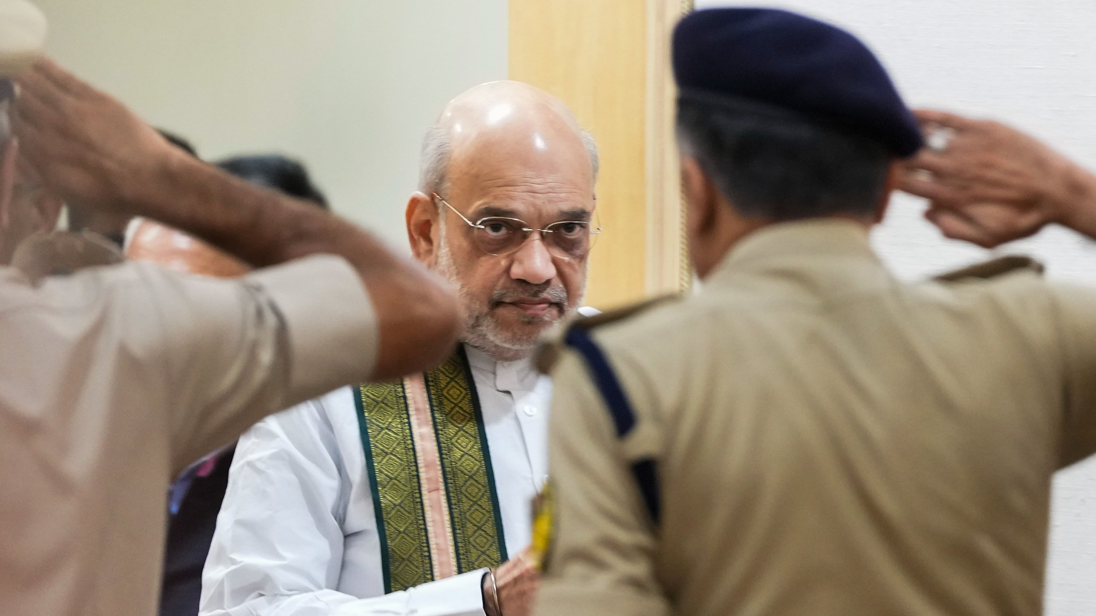 <div class="paragraphs"><p>Union Home Minister Amit Shah being saluted as he arrives to chair the 7th Apex Level Meeting of the Narco-Coordination Center (NCORD), in New Delhi, Thursday</p></div>