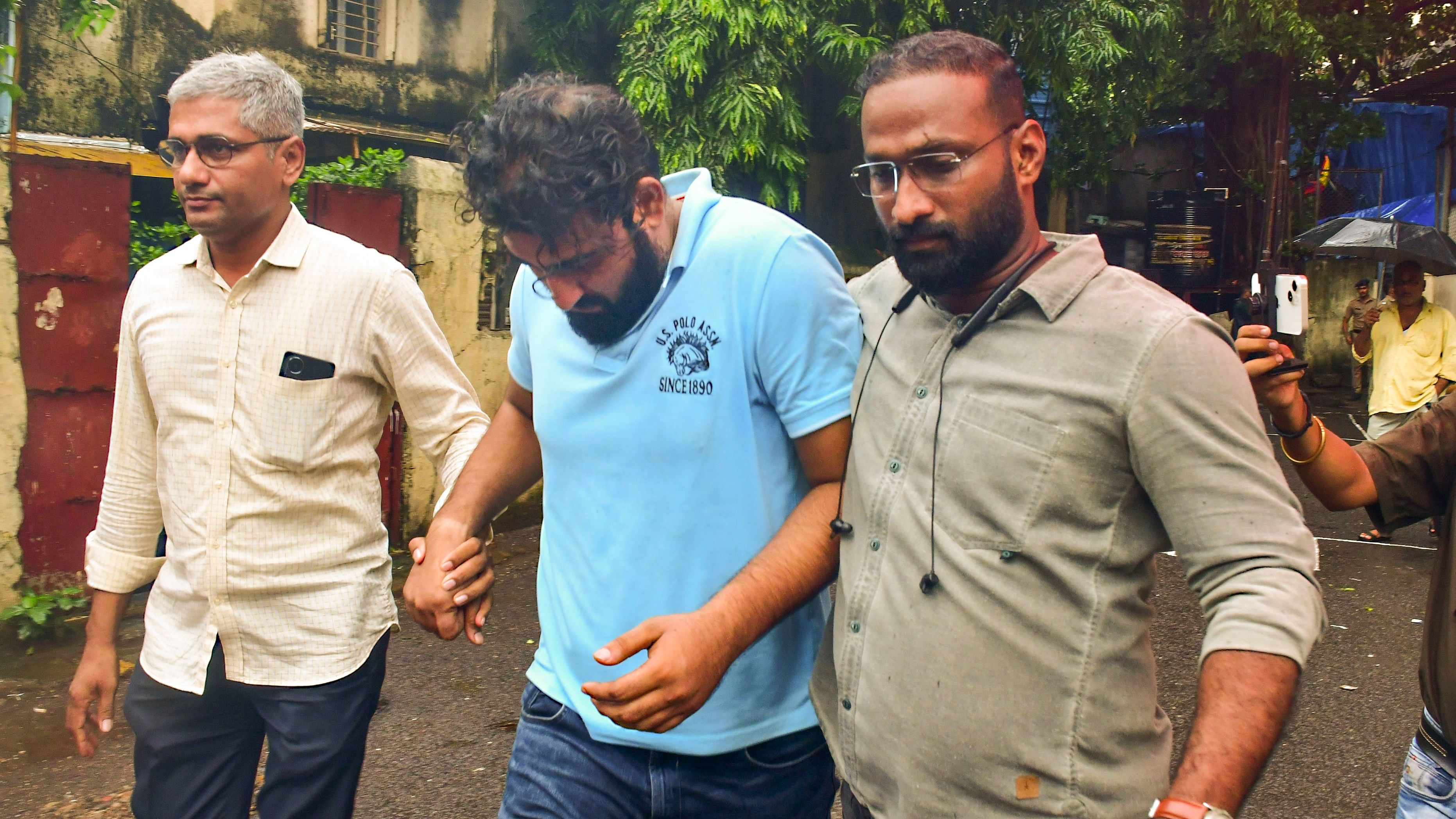 <div class="paragraphs"><p>Rajrishi Rajendrasingh Bidawat, accused in the Worli hit-and-run case, leaves after appearing before a court, in Mumbai, Monday.</p></div>