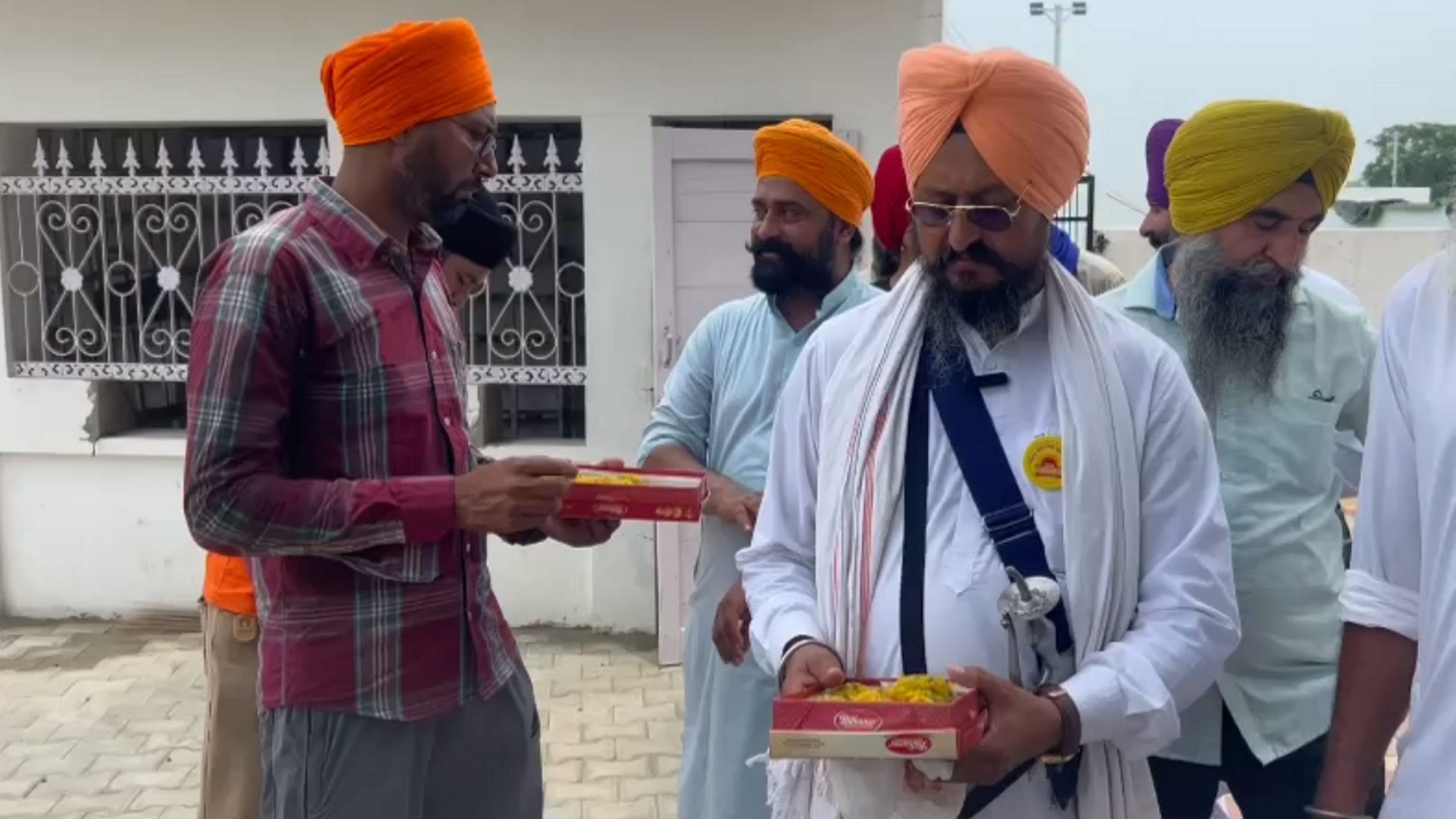 <div class="paragraphs"><p>Supporters of Waris Punjab De Chief Amritpal Singh celebrate after he took oath as Member of Parliament, in Ludhiana, on Friday.</p></div>