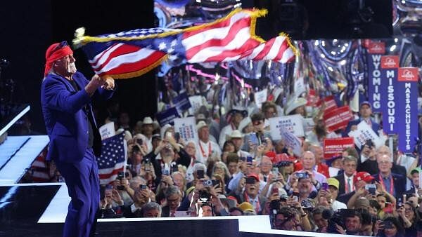 <div class="paragraphs"><p>Hulk Hogan, professional entertainer and wrestler, waves a U.S. flag as he takes the stage on Day 4 of the Republican National Convention (RNC), at the Fiserv Forum in Milwaukee, Wisconsin.</p></div>