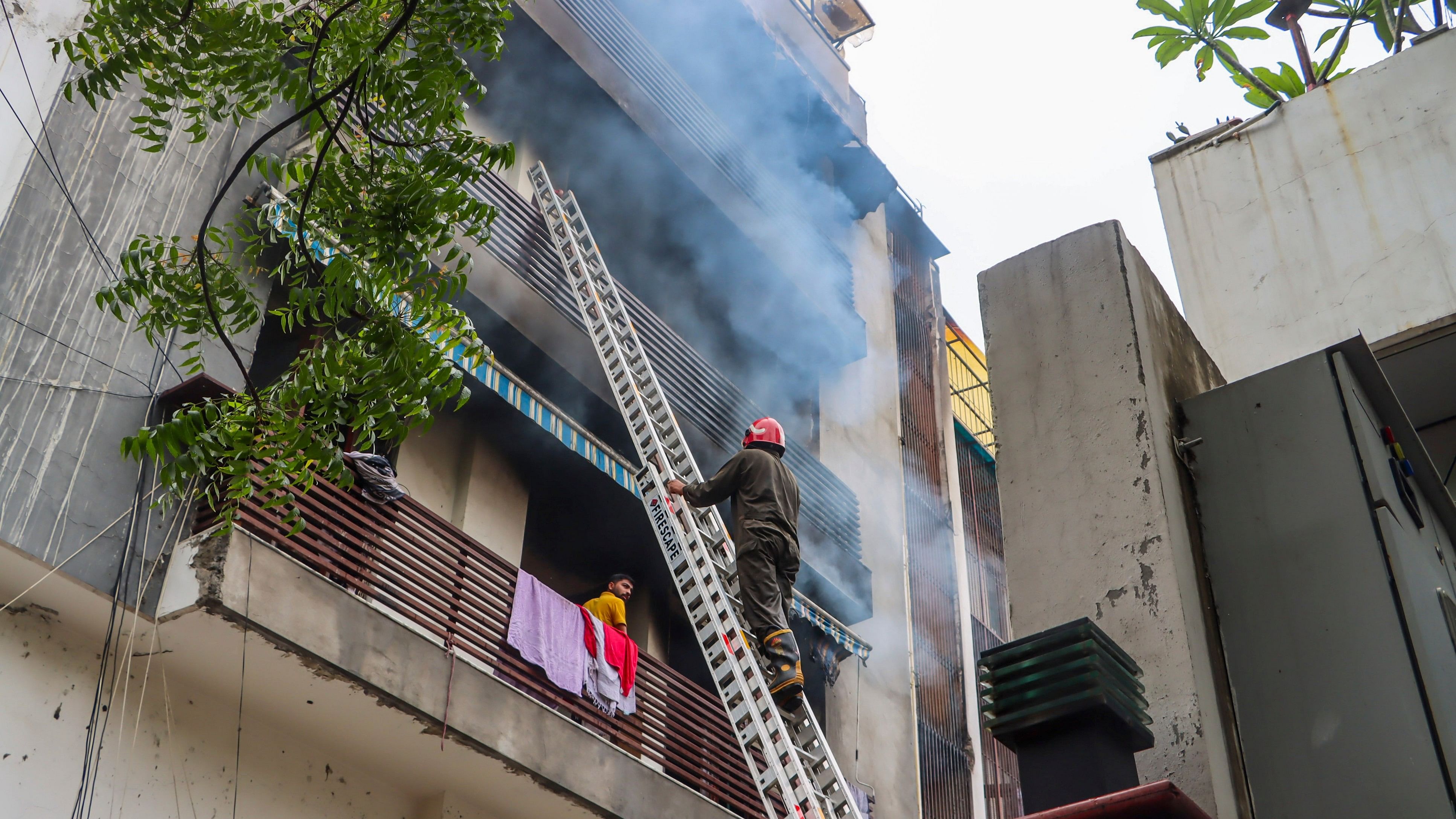 <div class="paragraphs"><p>A firefighter at the spot after a fire broke out in a house, at East of Kailash, in New Delhi, Thursday, July 4, 2024. </p></div>