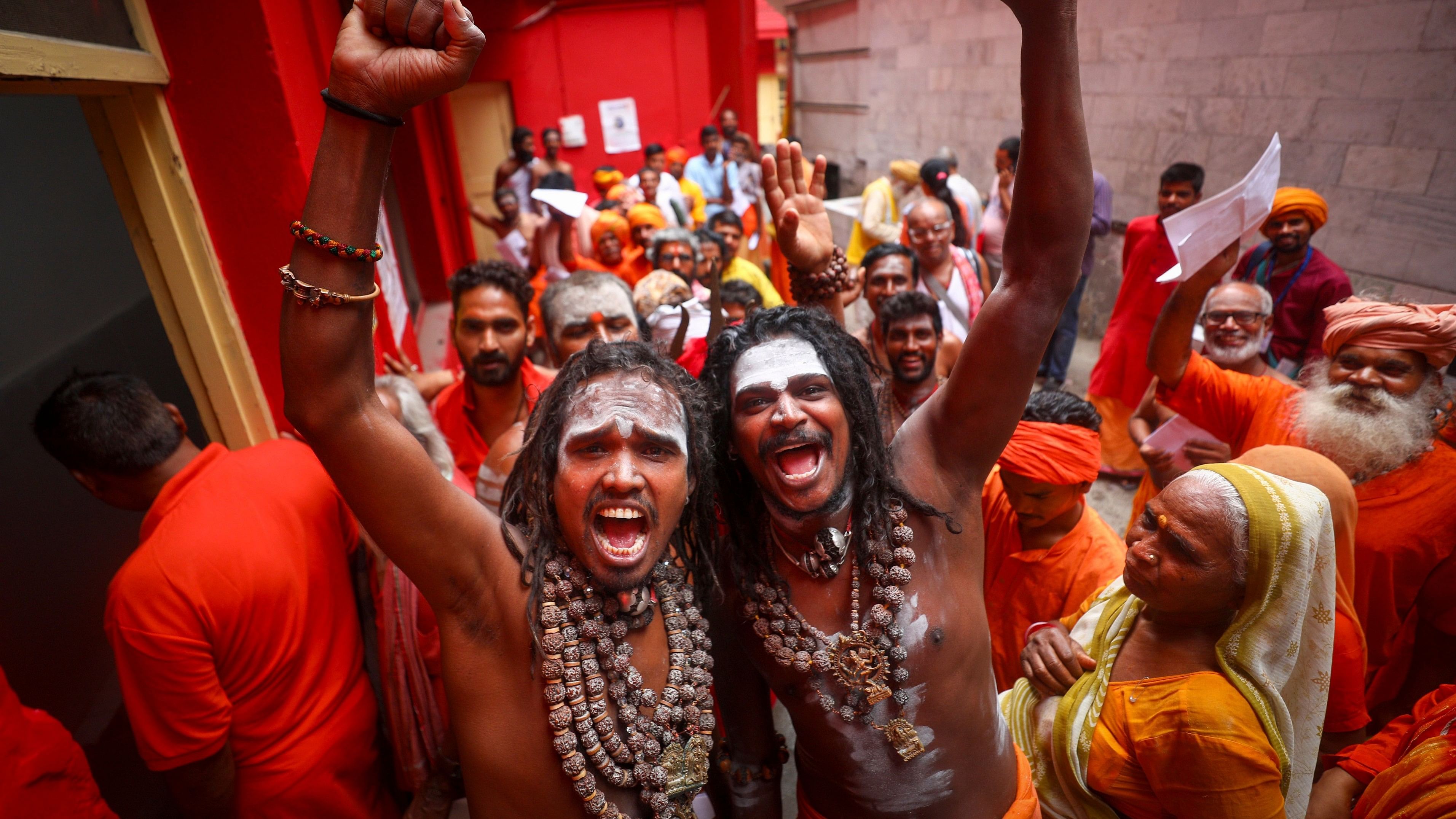 <div class="paragraphs"><p>Jammu: Sadhus wait for registration of Amarnath Yatra at Ram mandir base camp, in Jammu.</p></div>