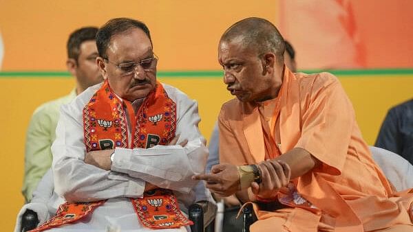 <div class="paragraphs"><p>Uttar Pradesh CM Yogi Adityanath (right) with BJP President J P Nadda</p></div>