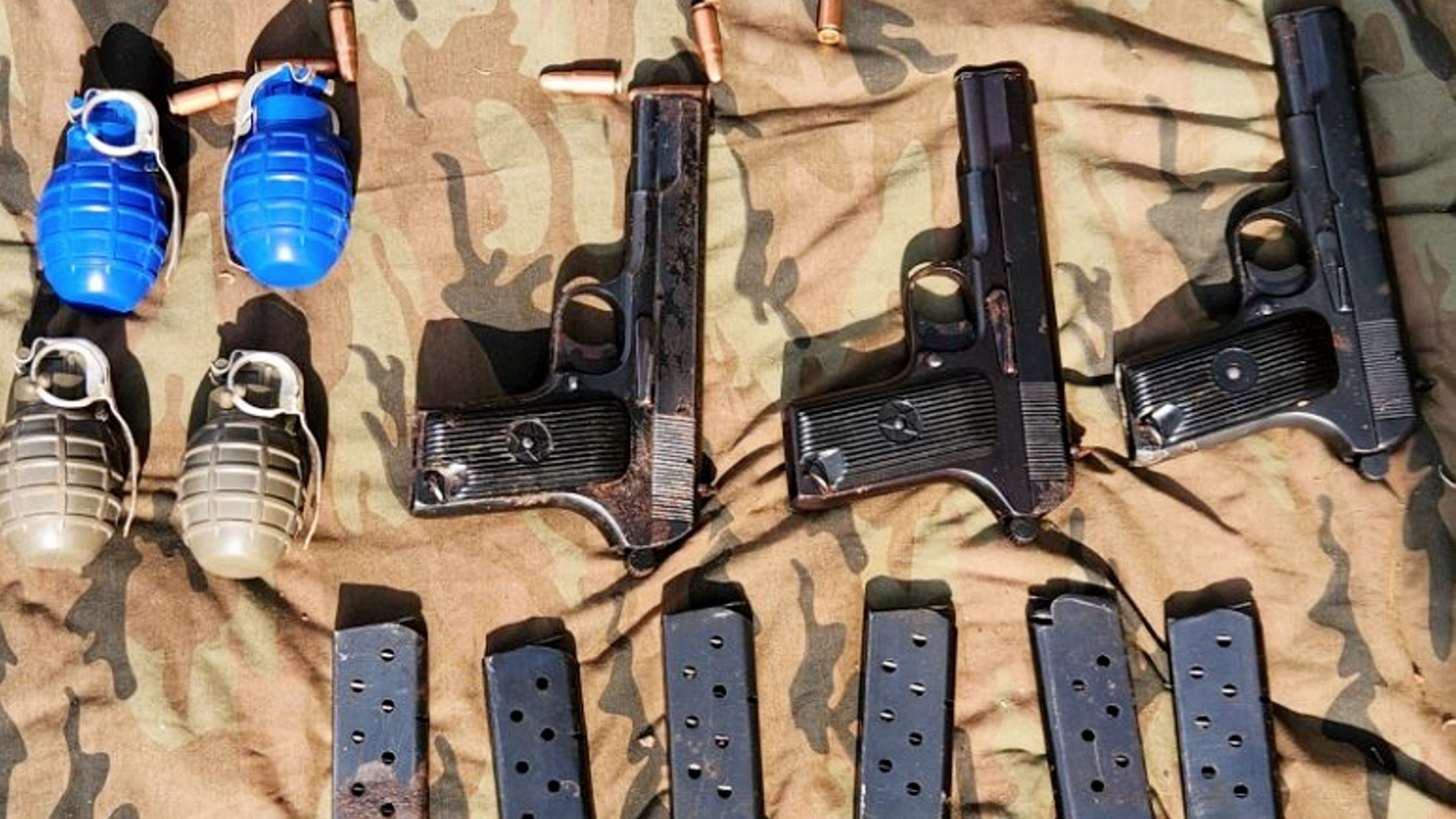 <div class="paragraphs"><p>Representative image showing arms and ammunitions seized by forces in Jammu and Kashmir.</p></div>