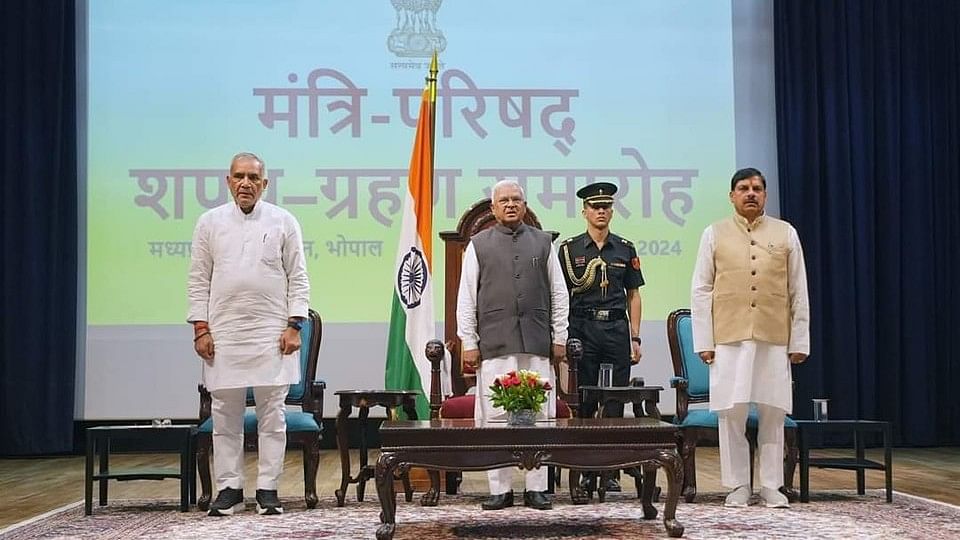 <div class="paragraphs"><p>From left: BJP leader Ramniwas Rawat, MP Governor Mangubah Patel and Madhya Pradesh CM Mohan Yadav.</p></div>