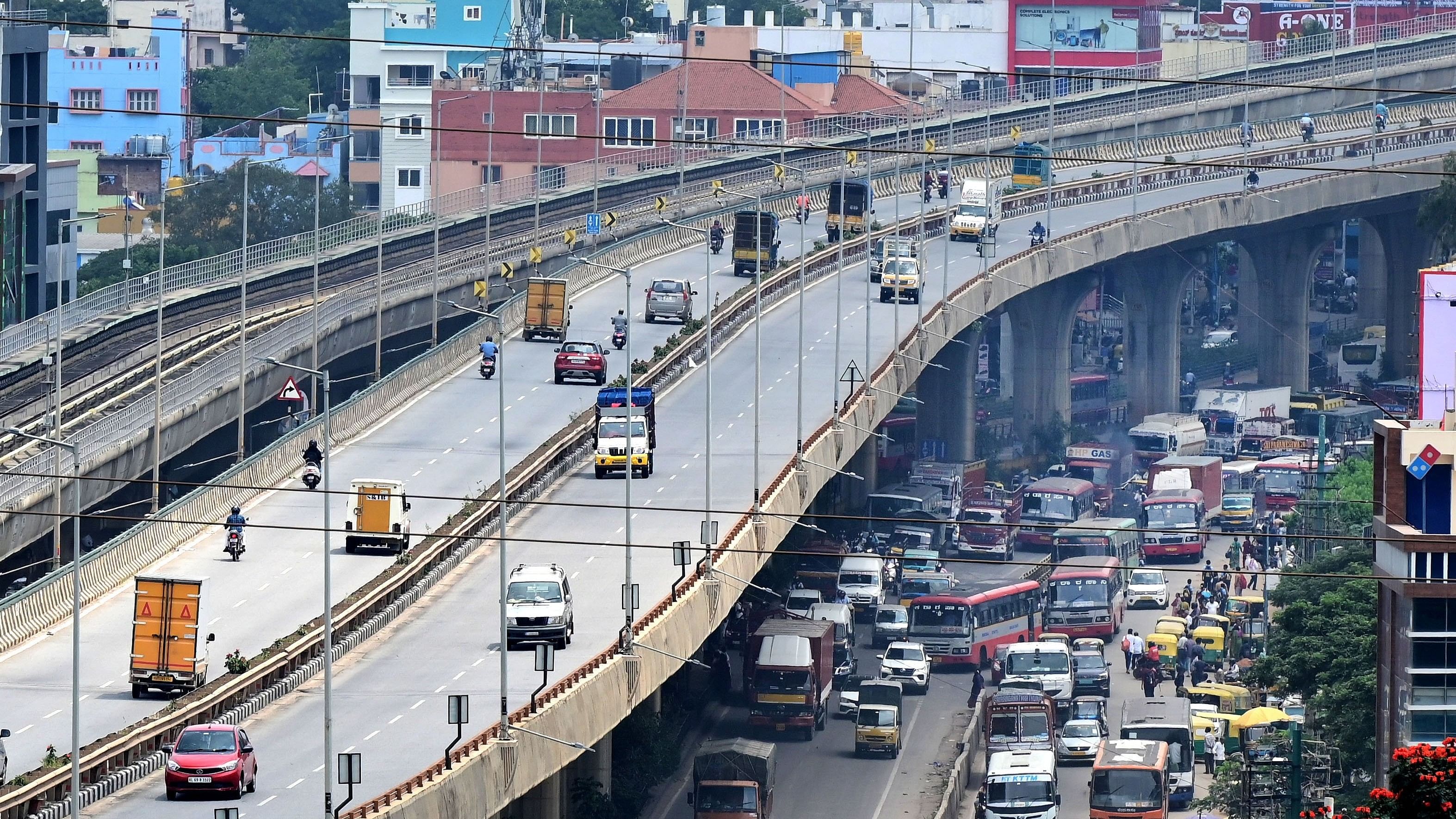 <div class="paragraphs"><p>The heavy vehicle ban on the flyover since December 2021 causes daily traffic jams&nbsp;on the road below. </p></div>