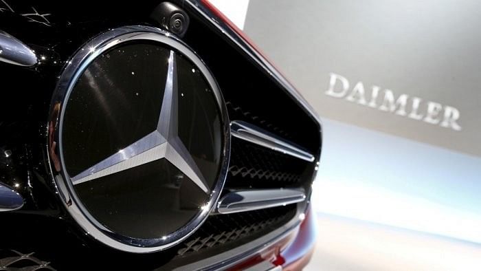 <div class="paragraphs"><p>Mercedes Benz logo as seen on a vehicle.</p></div>