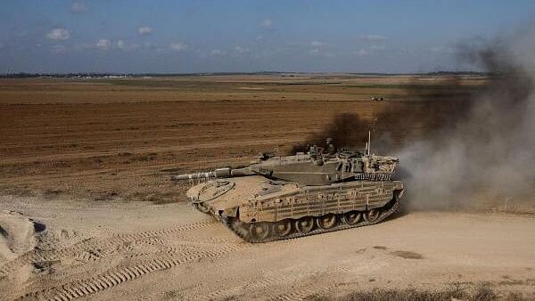 <div class="paragraphs"><p>An Israeli tank maneuvers near the Israel-Gaza border, amid the Israel-Hamas conflict, in Israel.&nbsp;</p></div>