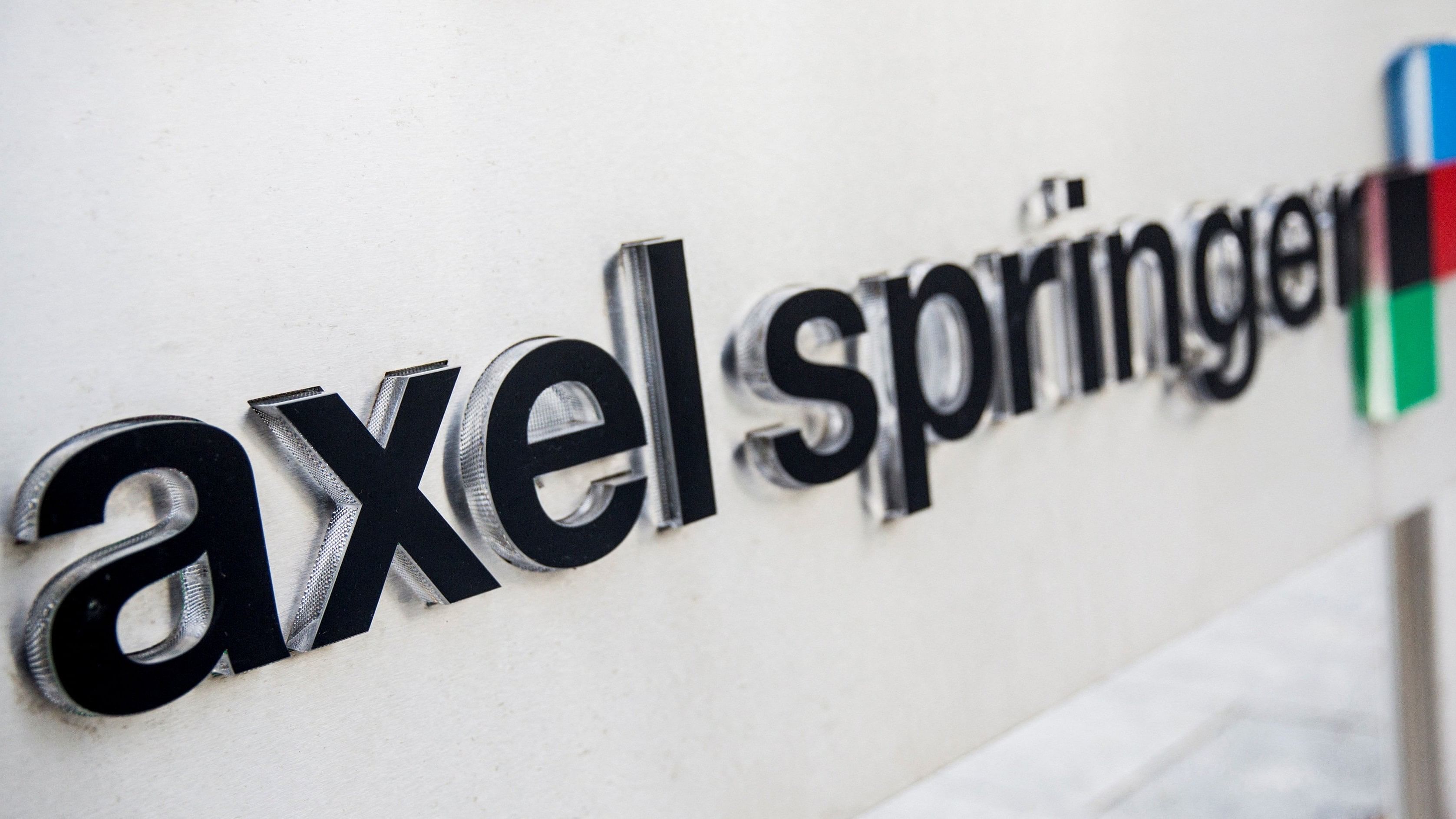 <div class="paragraphs"><p>The logo of German publisher Axel Springer is seen outside its headquarters in Berlin August 7, 2013. </p></div>