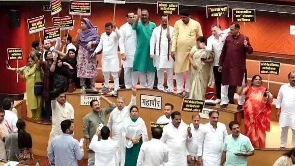 <div class="paragraphs"><p>BJP Councillors protest inside the MCD House over the death of three civil services aspirants due to drowning at a coaching centre in Old Rajendra Nagar area, in New Delhi, Monday.&nbsp;</p></div>