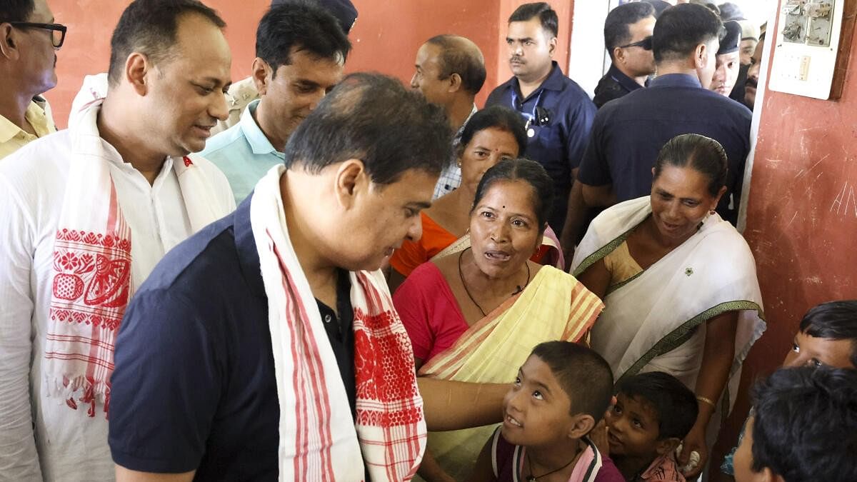 <div class="paragraphs"><p>Assam Chief Minister Himanta Biswa Sarma interacts with children during his visit to a flood-affected area in Kamrup district.&nbsp;</p></div>