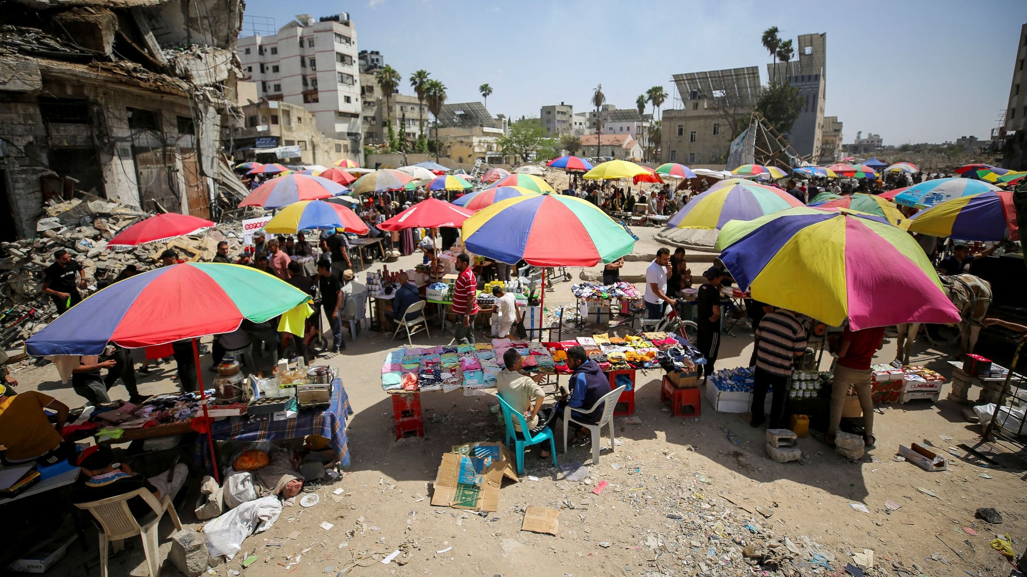 <div class="paragraphs"><p>Palestinian vendors sell goods in a street market amid a cash crunch caused by the destruction and closure of banks, as conflict between Israel and Hamas continues.</p></div>