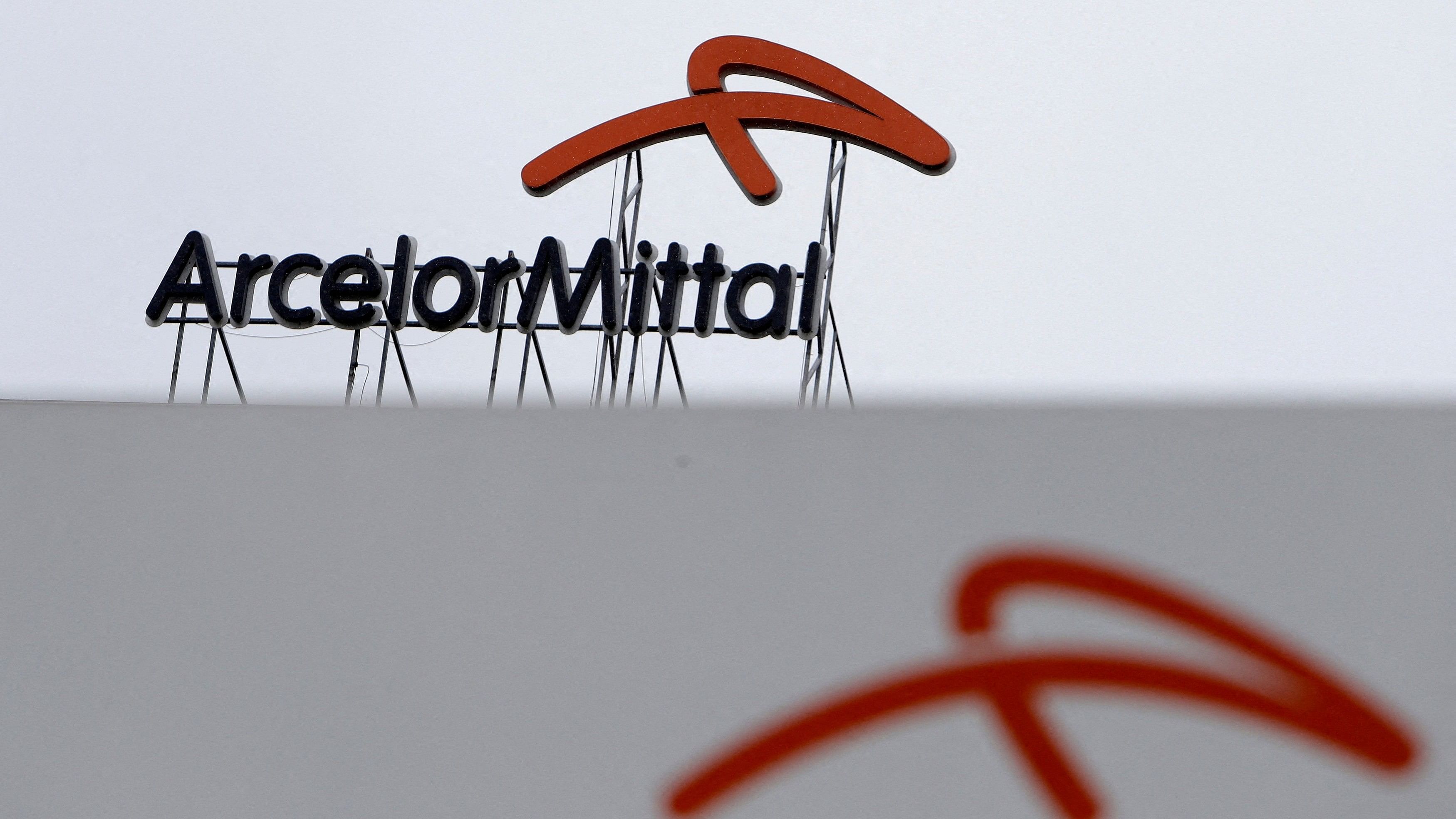 <div class="paragraphs"><p>A logo of ArcelorMittal on the roof of one of its steel plants.</p></div>