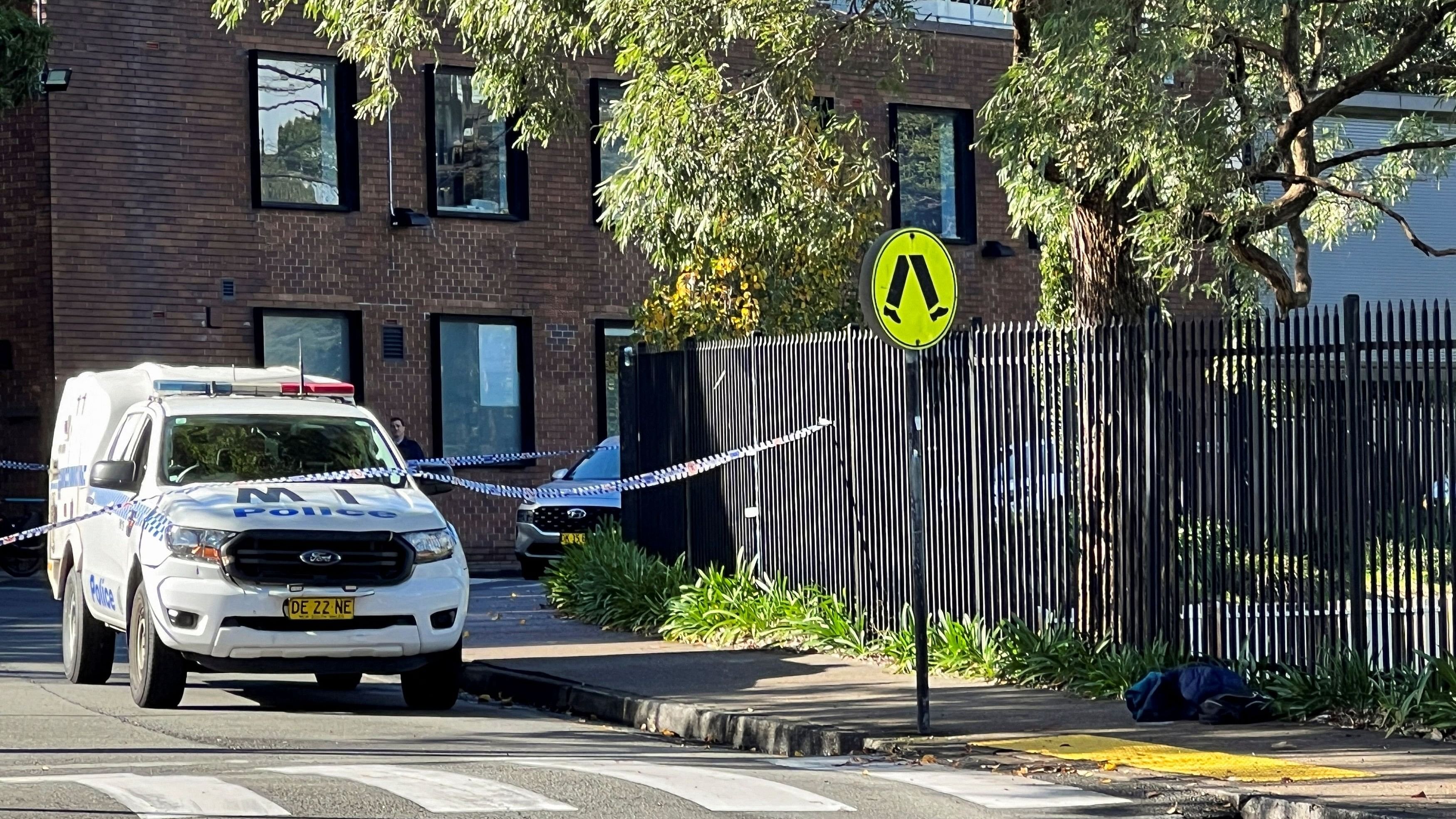 <div class="paragraphs"><p>A police vehicle is seen at the scene after a 14-year-old boy was arrested and a 22-year-old man was taken to hospital following a stabbing incident at the University of Sydney in Camperdown, Australia on July 2, 2024. </p></div>