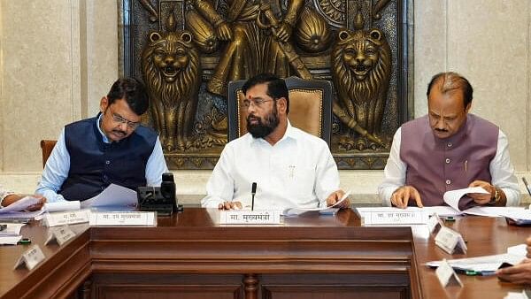 <div class="paragraphs"><p>Maharashtra Chief Minister Eknath Shinde, Dy CMs Devendra Fadnavis and Ajit Pawar during a meeting.</p></div>