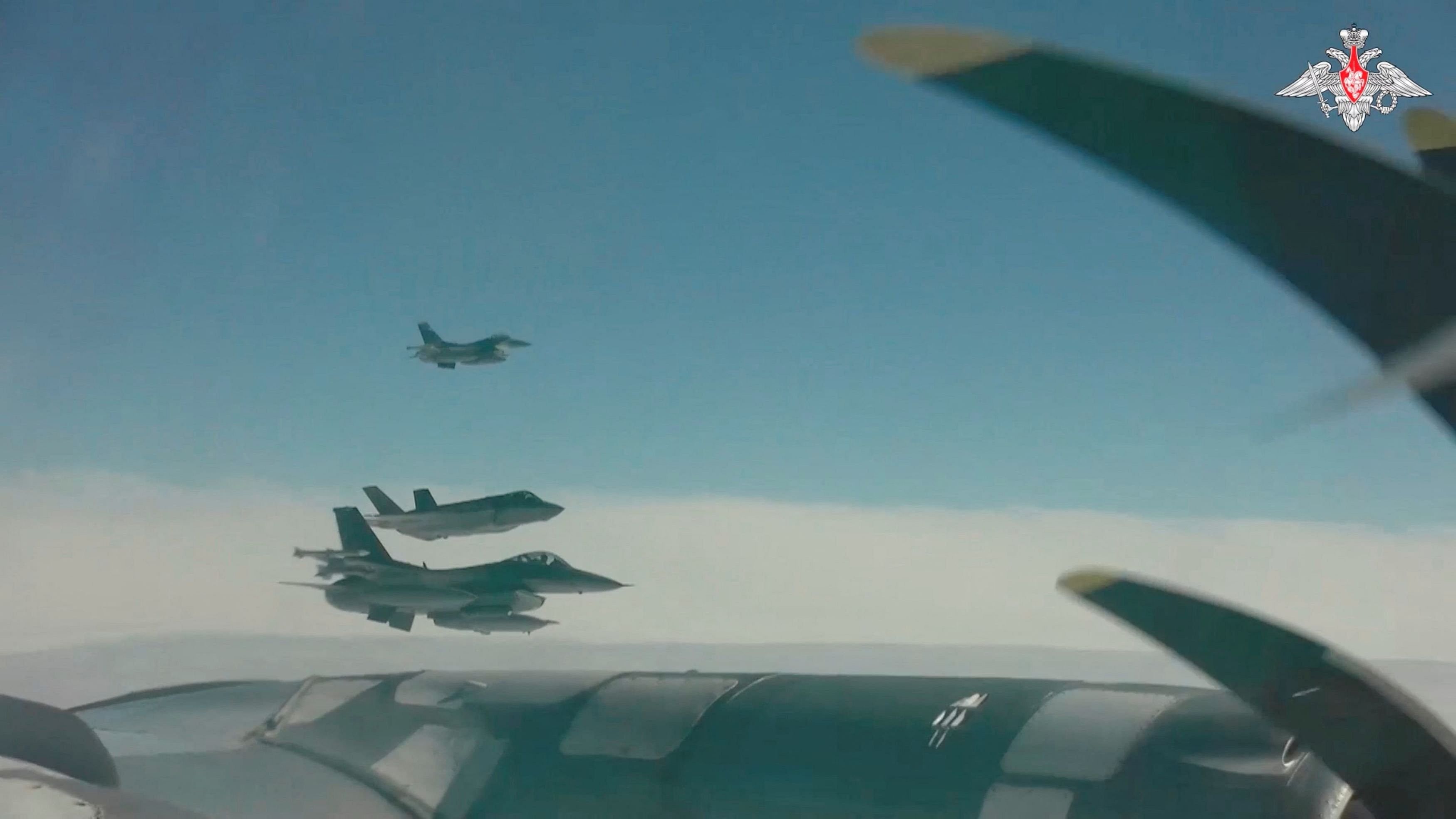 <div class="paragraphs"><p>US and Canadian jet fighters are seen next to a Russian TU-95 bomber as it conducts joint Russian and Chinese military plane patrols near the US state of Alaska, in this still image from a video released July 25, 2024.  </p></div>